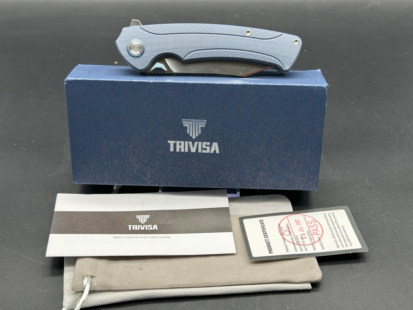 Trivisa Lynx-03, blue G10 handle w/titanium clip S35VN brushed satin