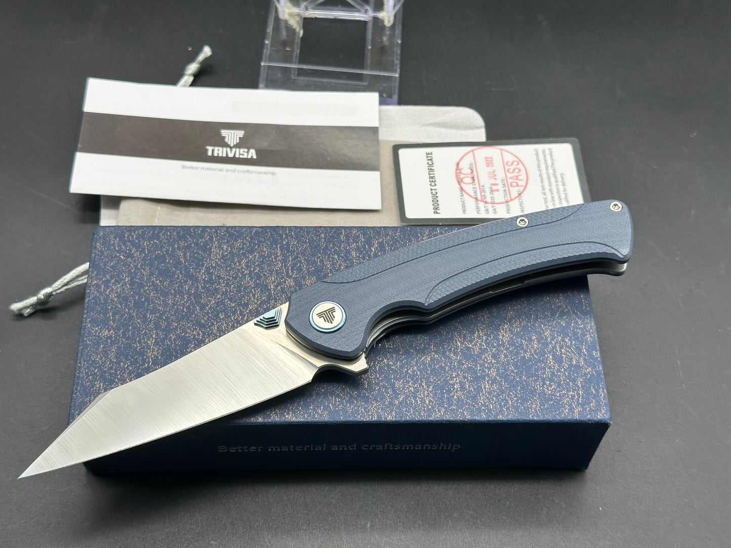 Trivisa Lynx-03, blue G10 handle w/titanium clip S35VN brushed satin