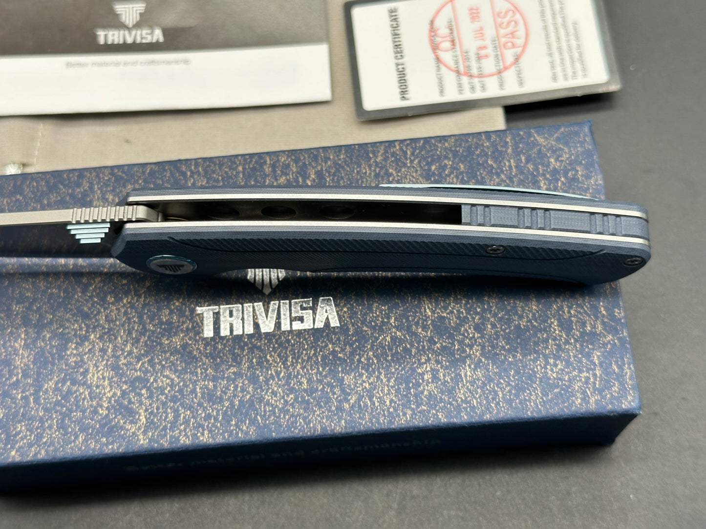 Trivisa Lynx-03, blue G10 handle w/titanium clip S35VN brushed satin