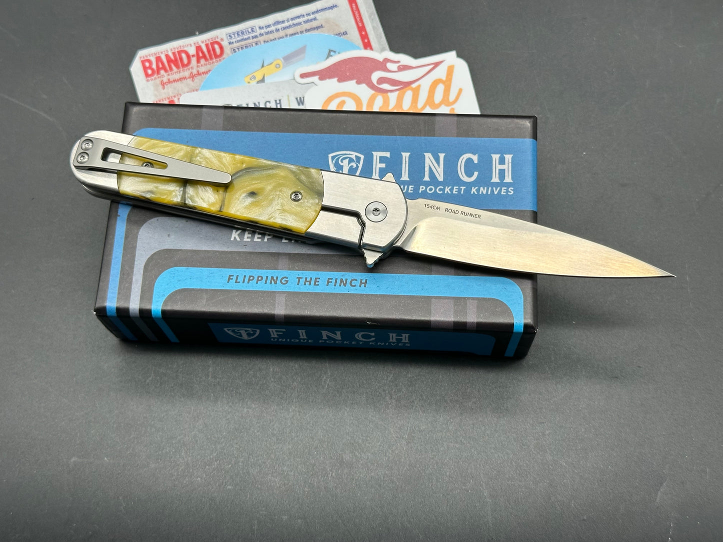 Finch Roadrunner Hornet, Integrated Stainless Liner Bolster, Yellow Resin, Satin 154CM blade