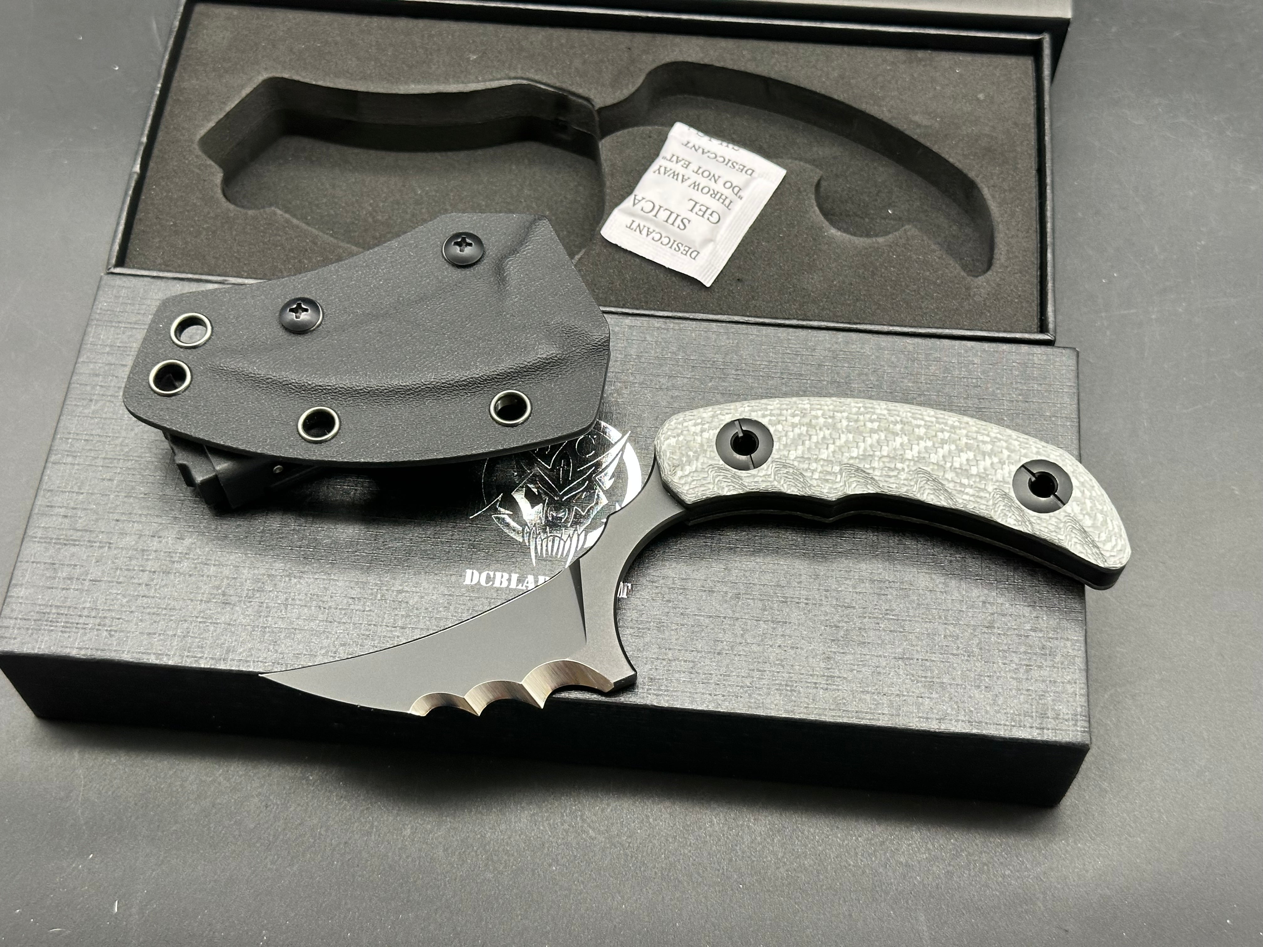 DC Blades Mantis Fixed blade 3.25" Black PVD Blade with Serrations 14C28N  Silver Twill Carbon Fiber Handle
