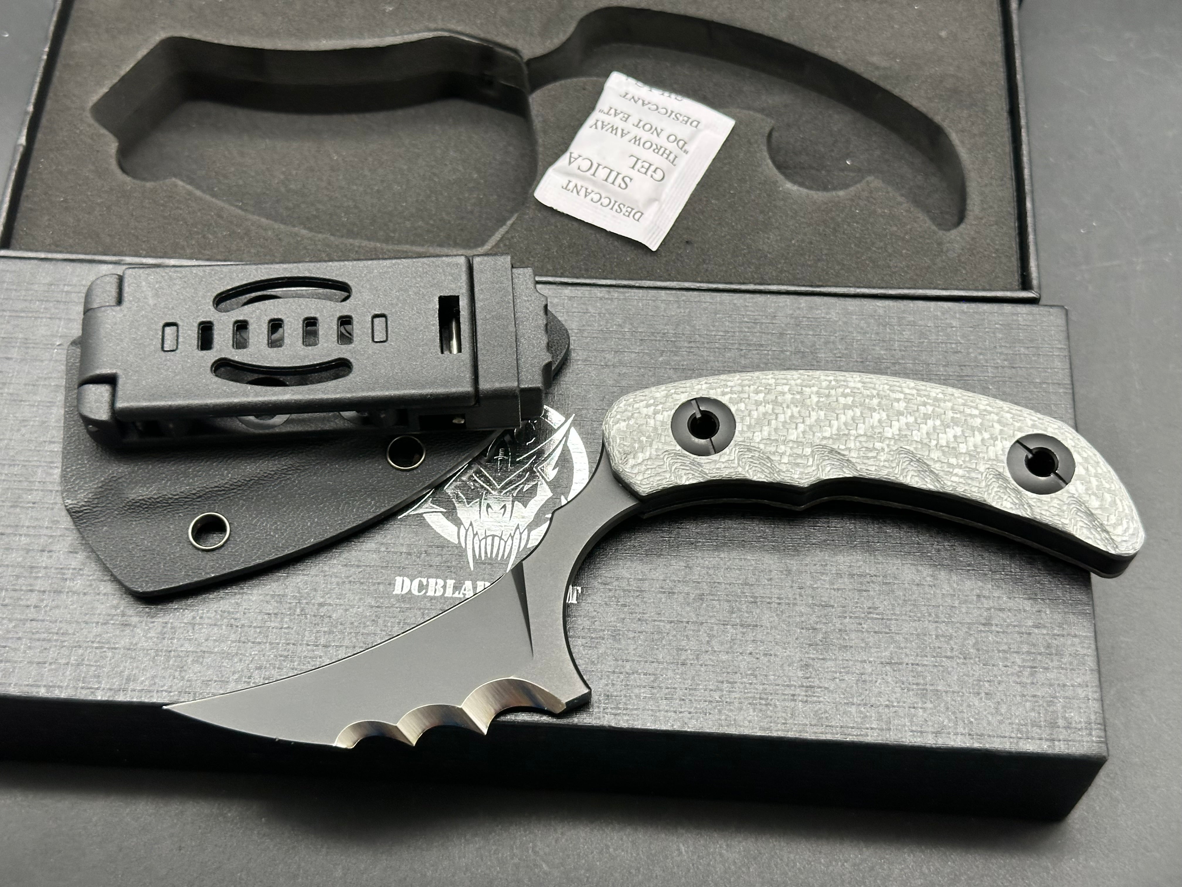 DC Blades Mantis Fixed blade 3.25" Black PVD Blade with Serrations 14C28N  Silver Twill Carbon Fiber Handle