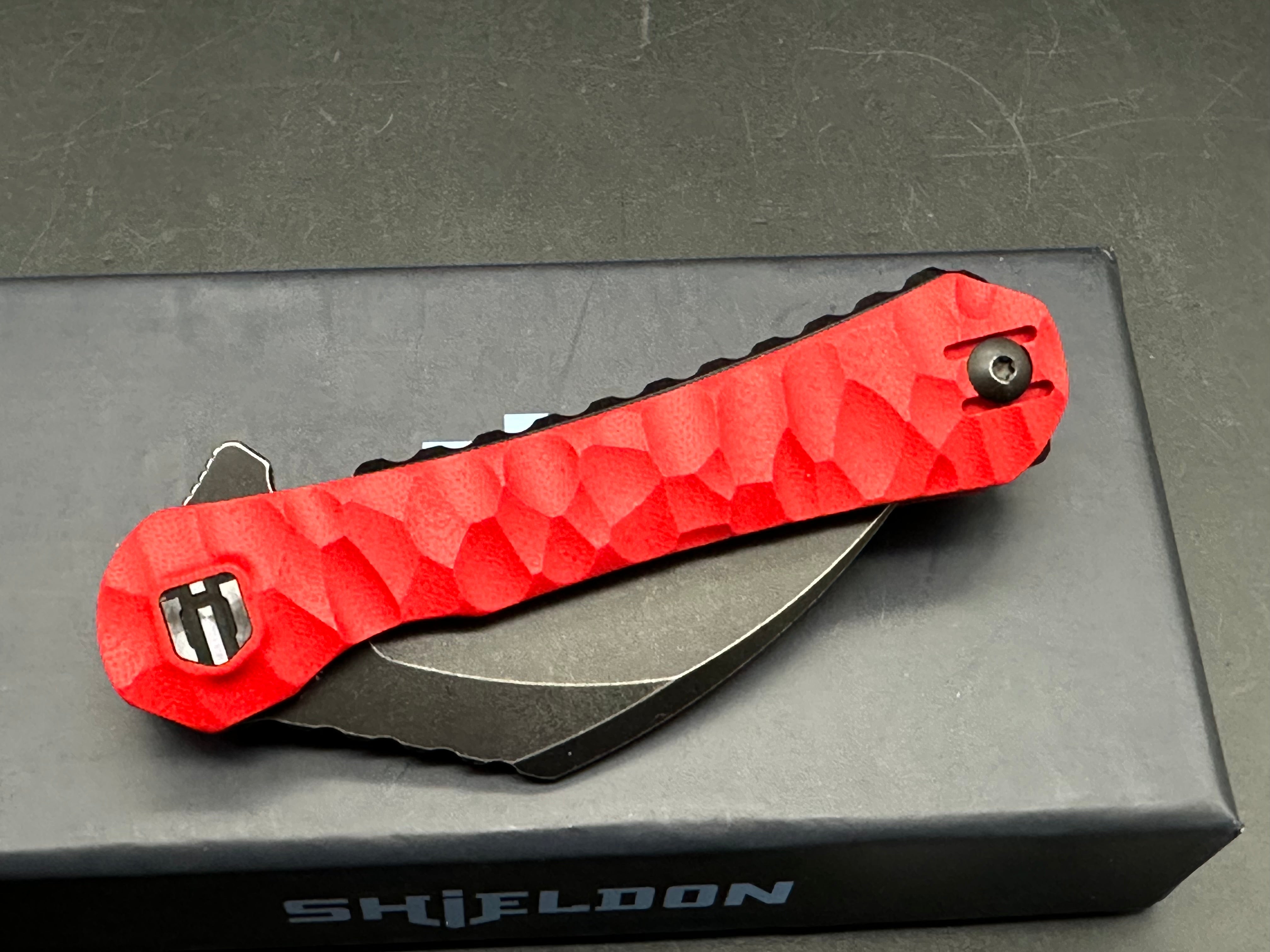 Shieldon Blades Scythe XL folder Blackwash Titanium coated blade of 154CM Red G10 Handle