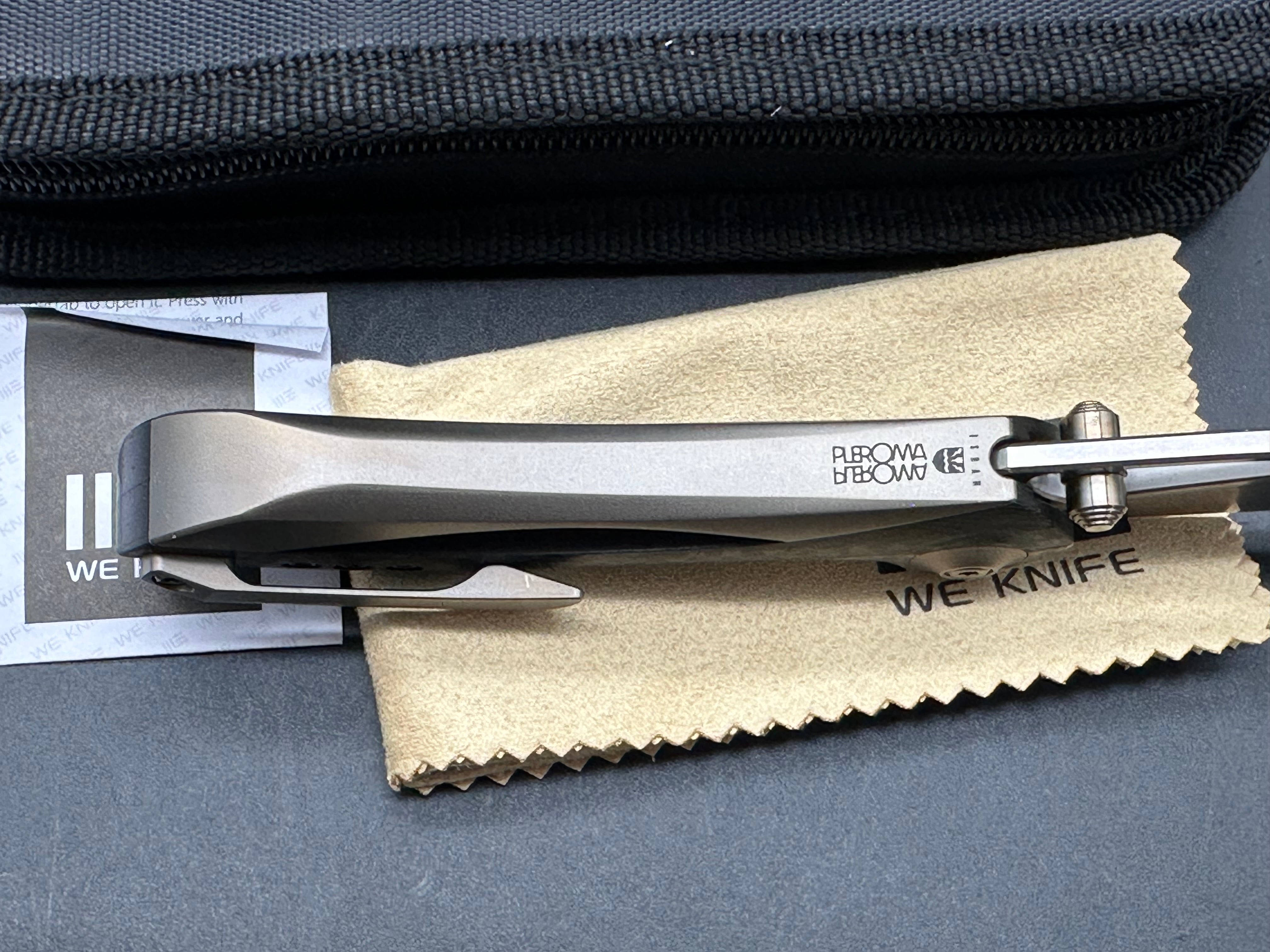 We Pleroma: Elijah Isham design. 2.95 inch M390 Carbon fiber and integral champagne titanium handle