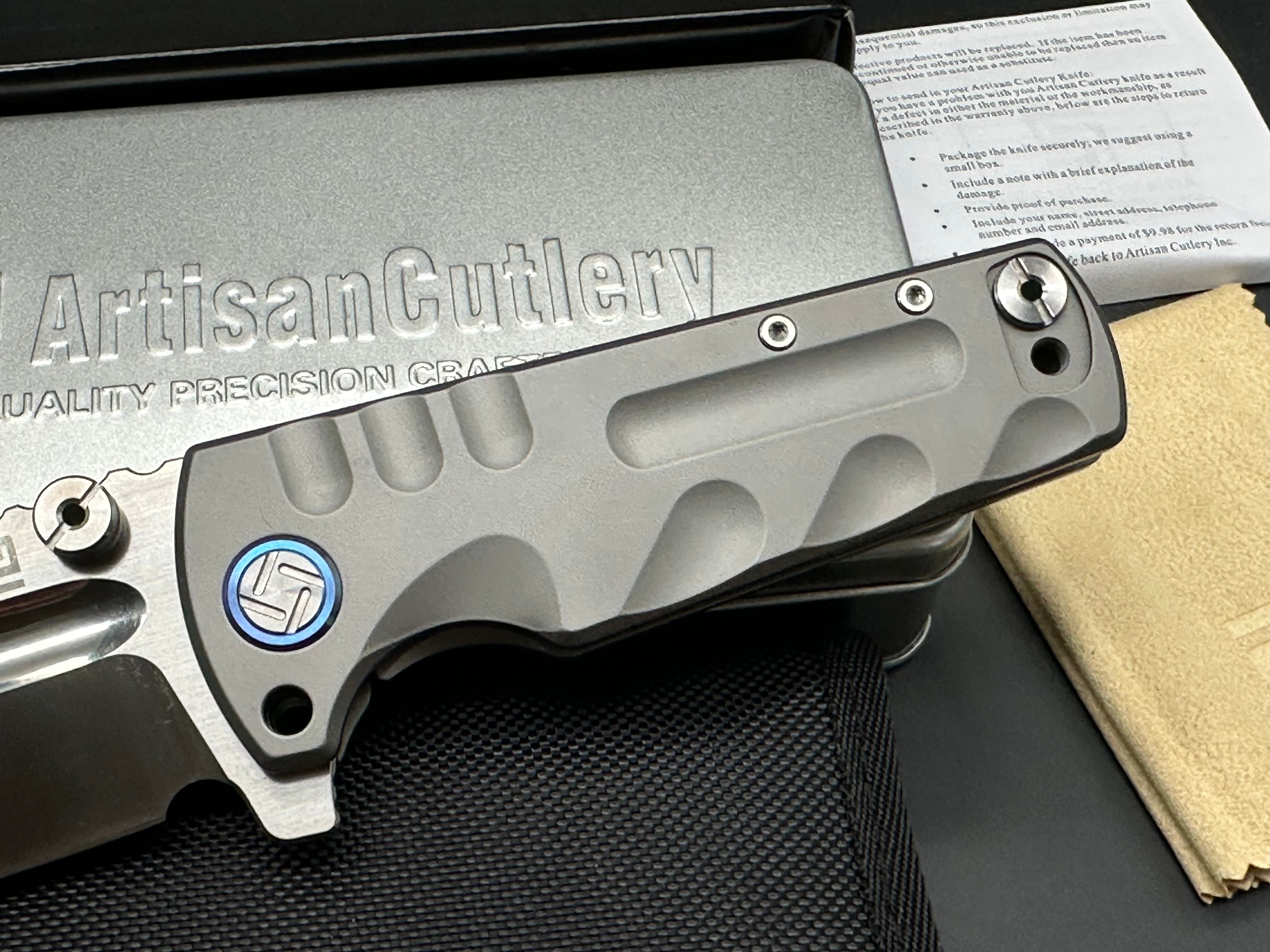 Artisan Cutlery Proponent: 3.85 inch, satin flat grind, s35VN Wharncliffe blade. Frame lock. Titanium handle