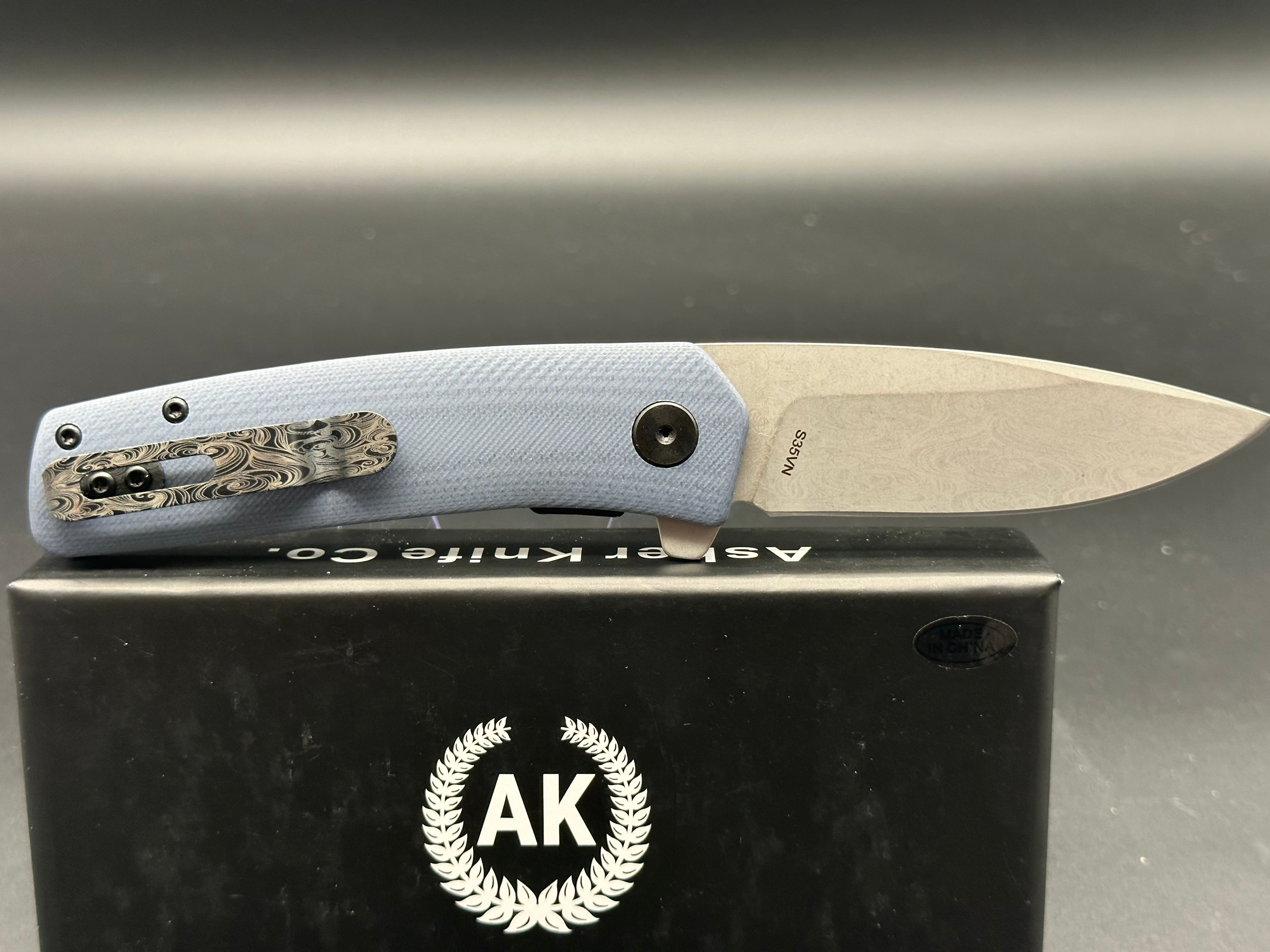 Asher Knives Spiro (Factory second) sea of snakes etch on the blade and clip grey scales