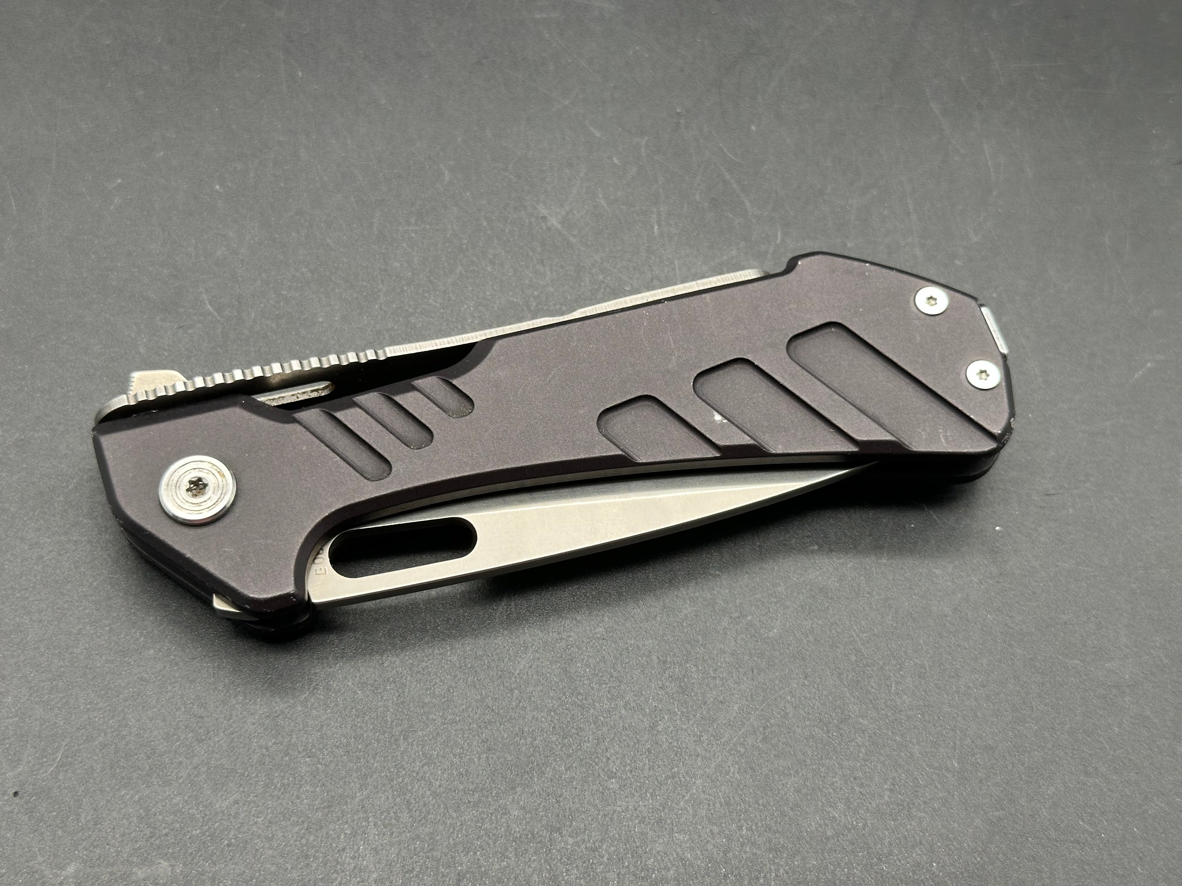 Buck 830 Marskman aluminum scales 154CM blade