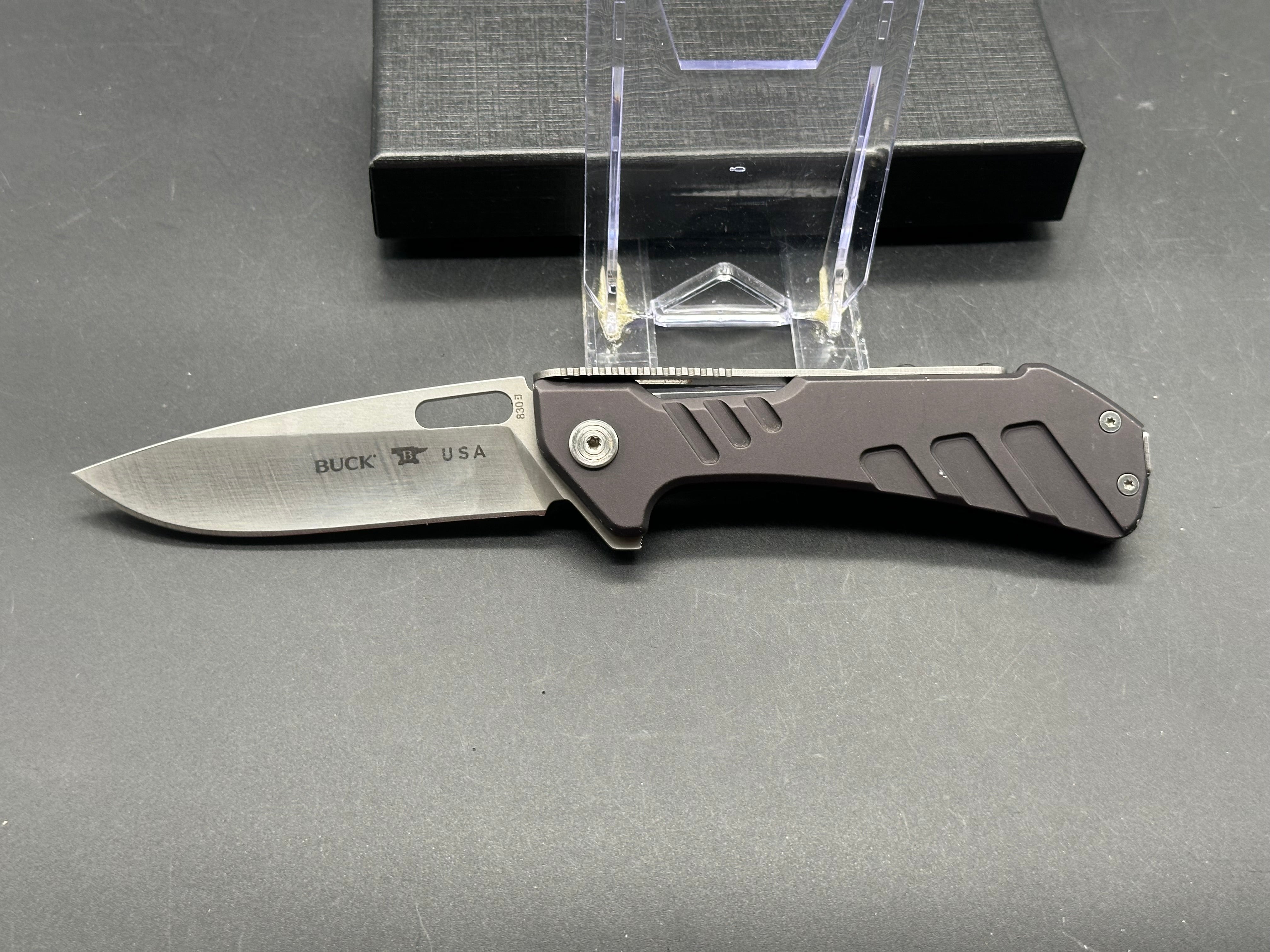 Buck 830 Marskman aluminum scales 154CM blade