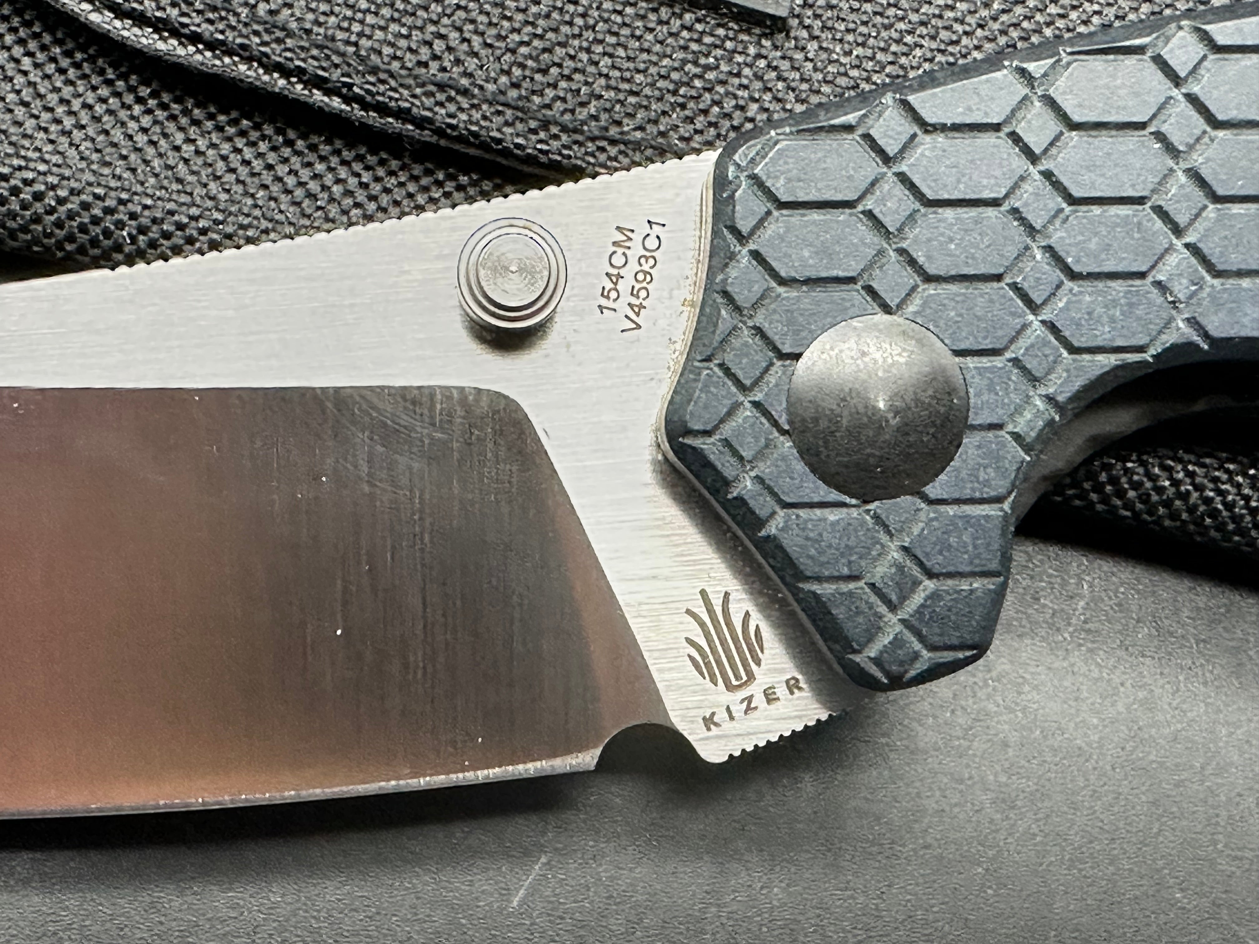 Kizer Towser K - 154CM Steel.  Blue Richlite