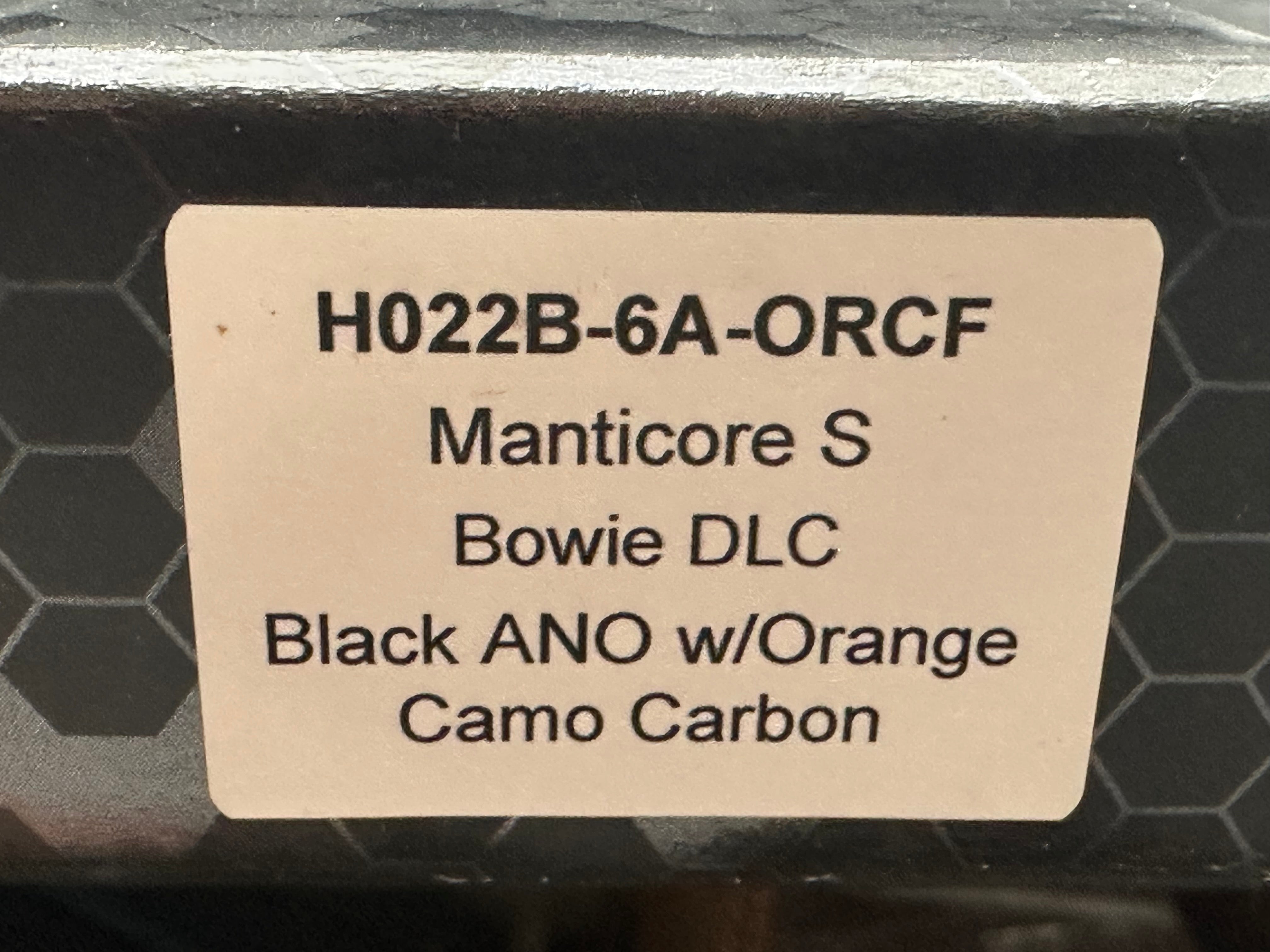 Heretic Manticore S Bowie DLC black ano w/Orange camo carbon
