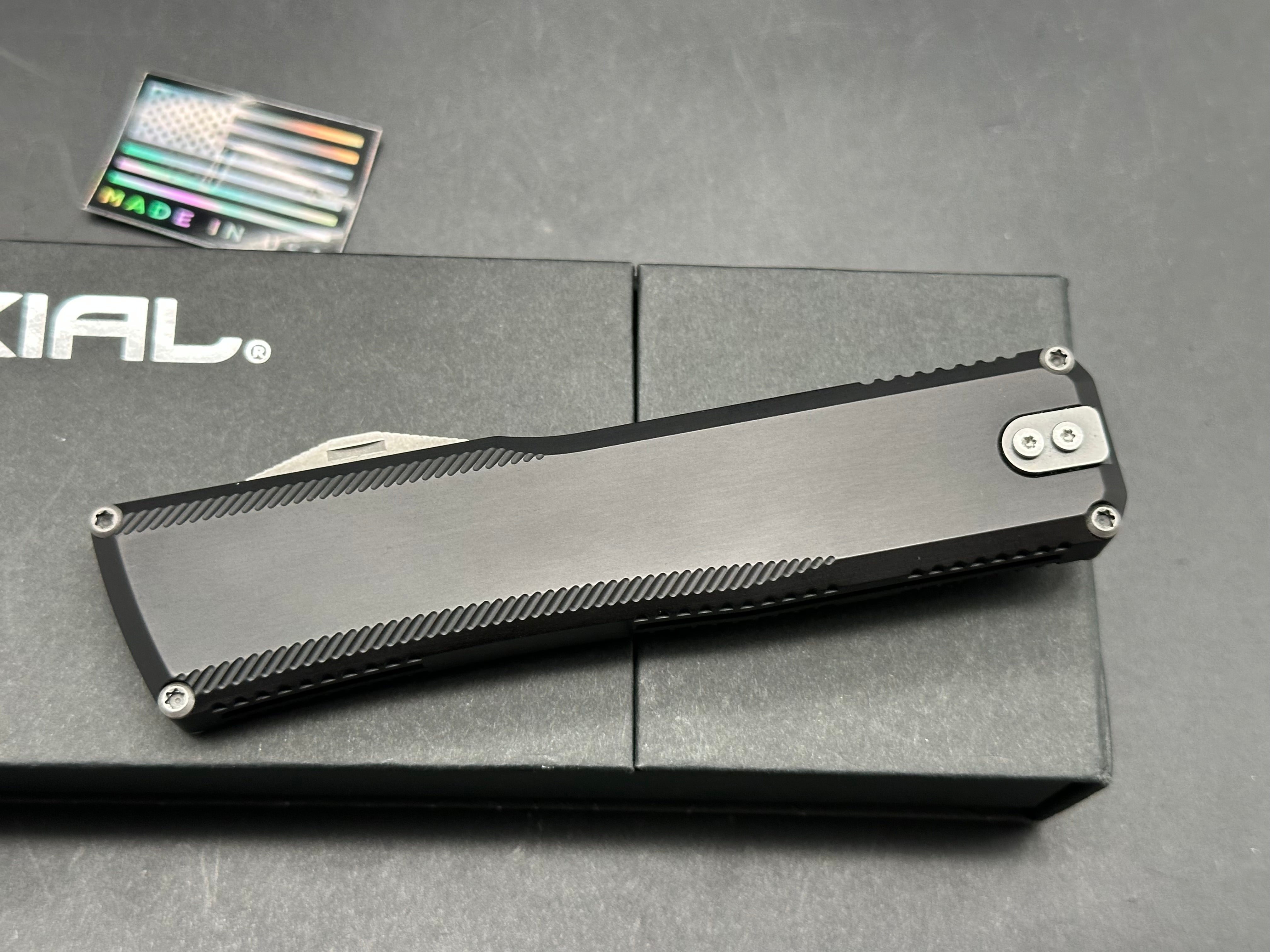Axiel D.E. OTF knife magnacut blade