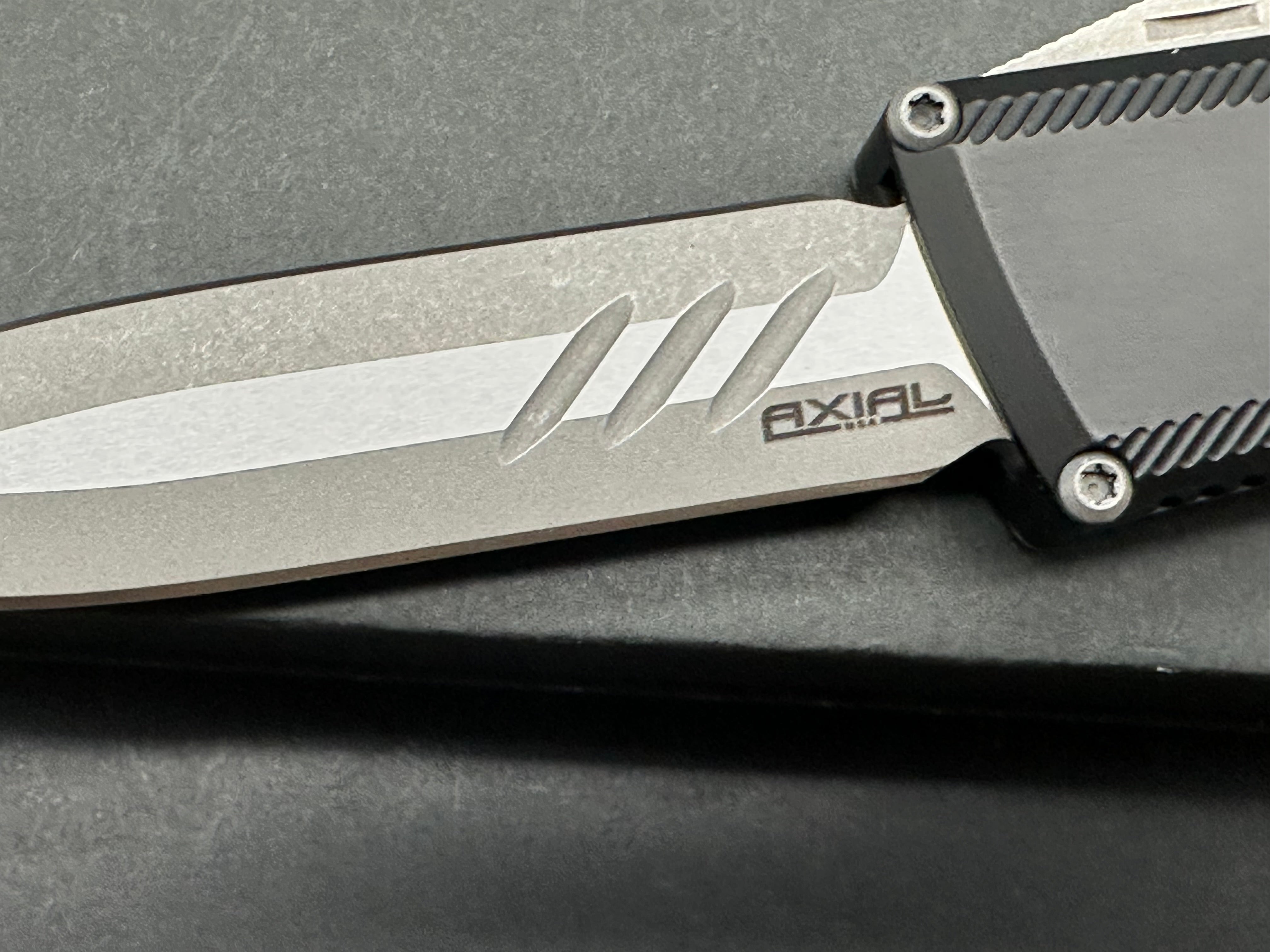Axiel D.E. OTF knife magnacut blade