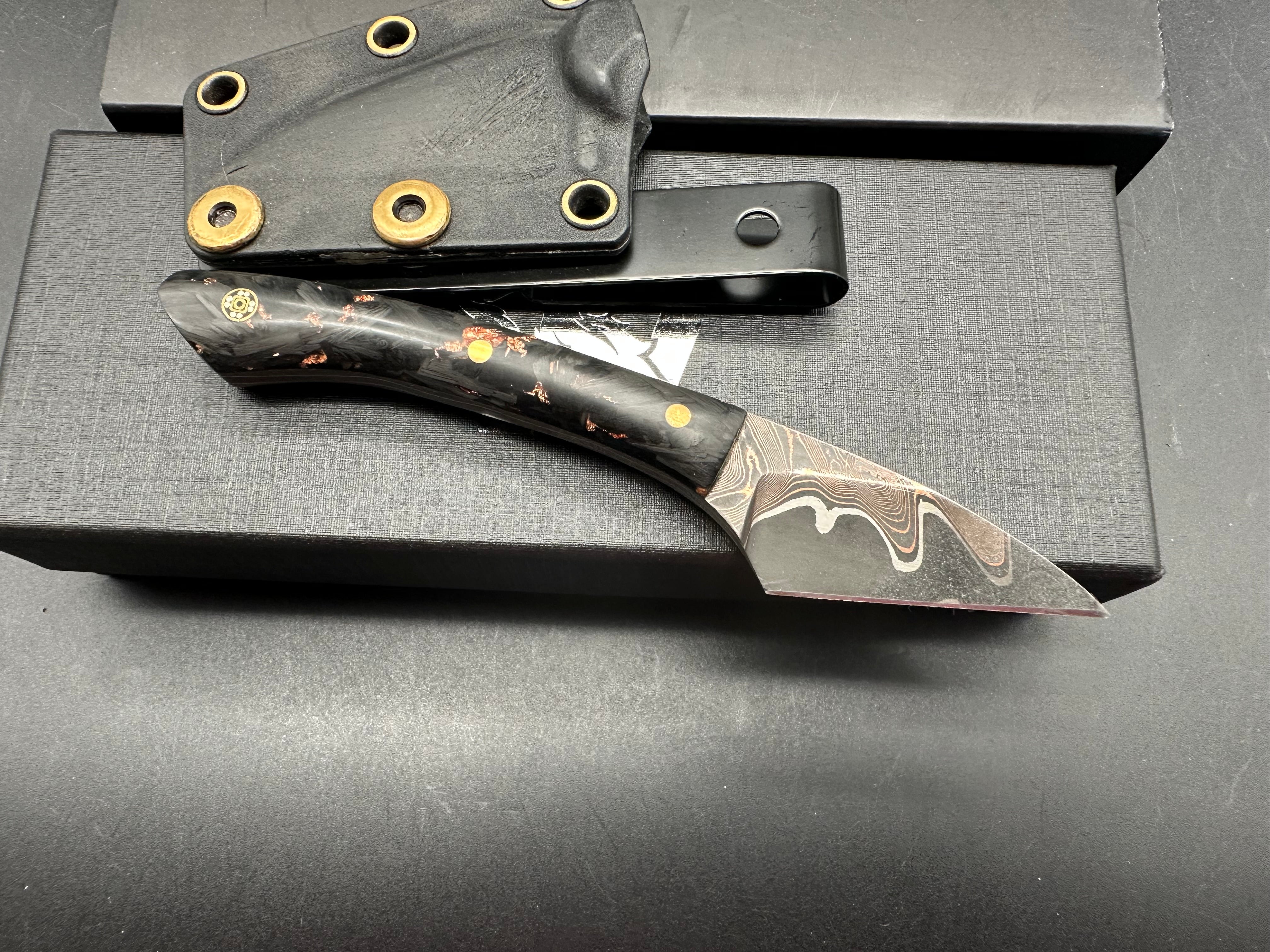 Raymond Roberts of Royalty Rings Co. Kiradashi Bakers Forge Damascus steel with copper and 80CRV2 core