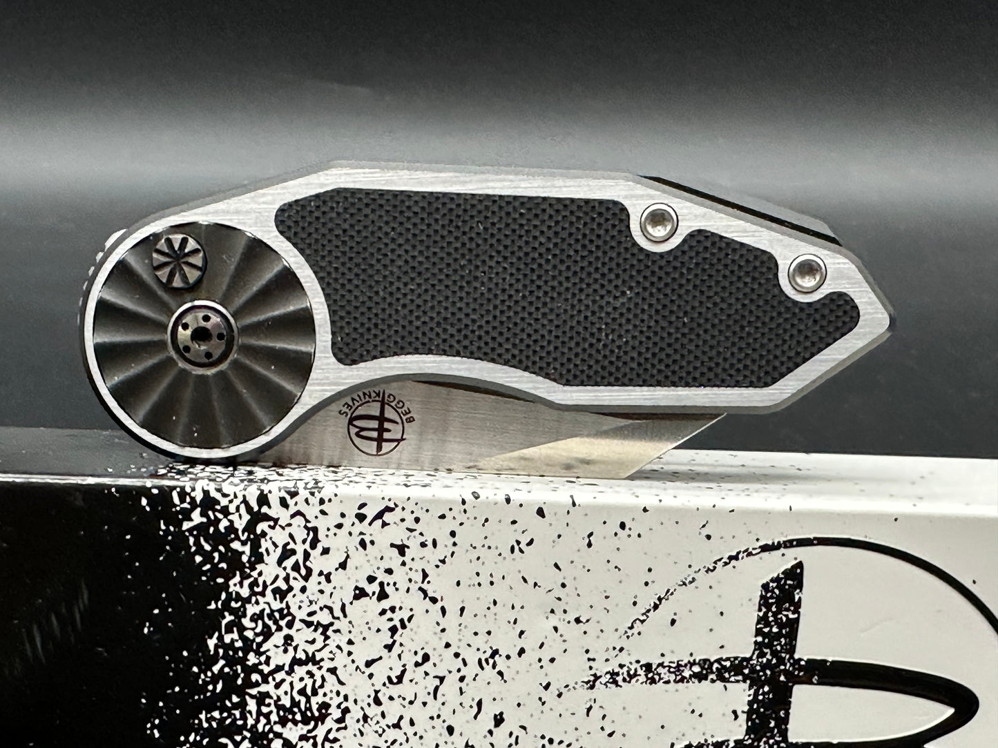 Begg Knives Micro Burst Rosette Button Lock Knife Al + Black G-10