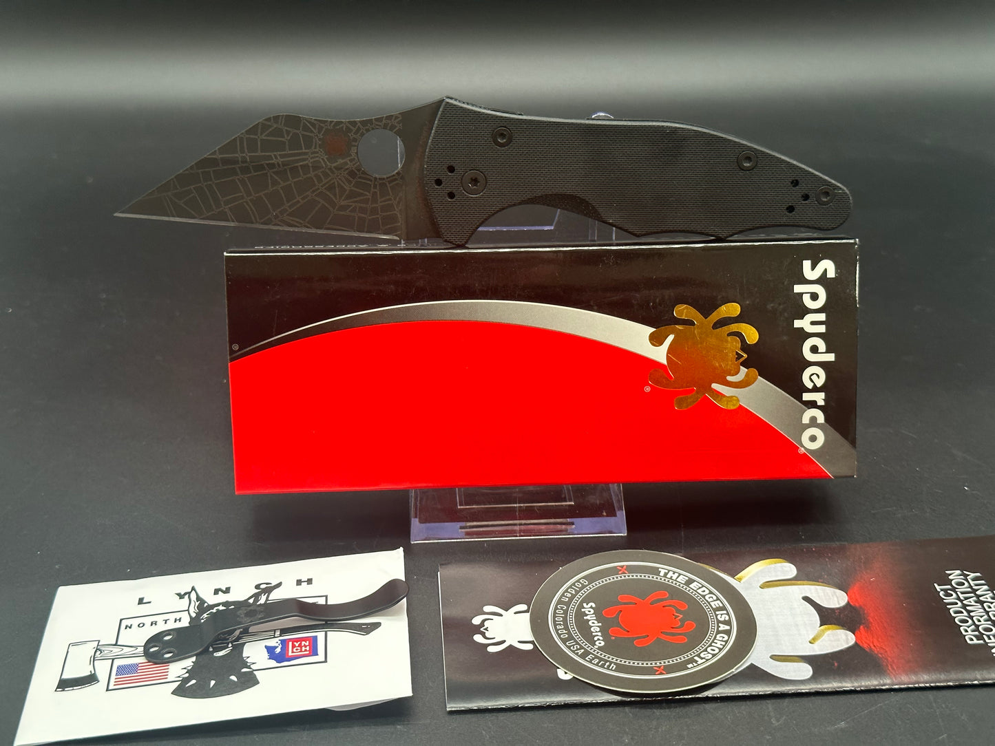 Spyderco Yojimbo 2 Black customized by Lynch NW with laser engraved spider web on blade