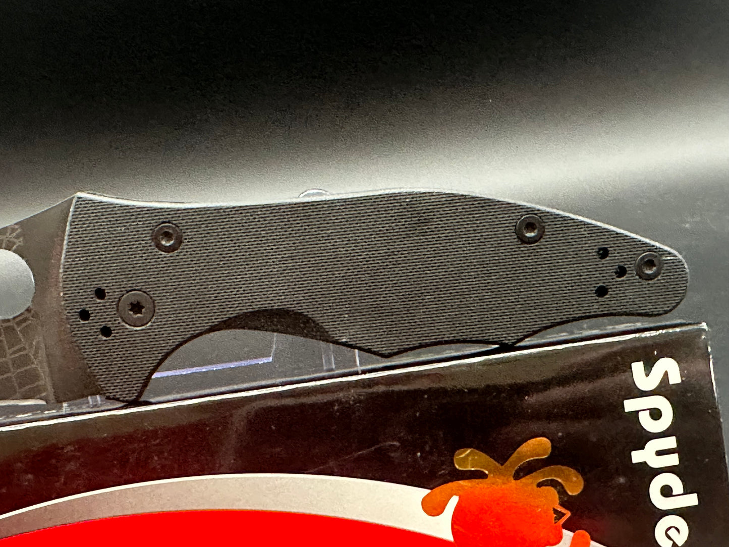 Spyderco Yojimbo 2 Black customized by Lynch NW with laser engraved spider web on blade