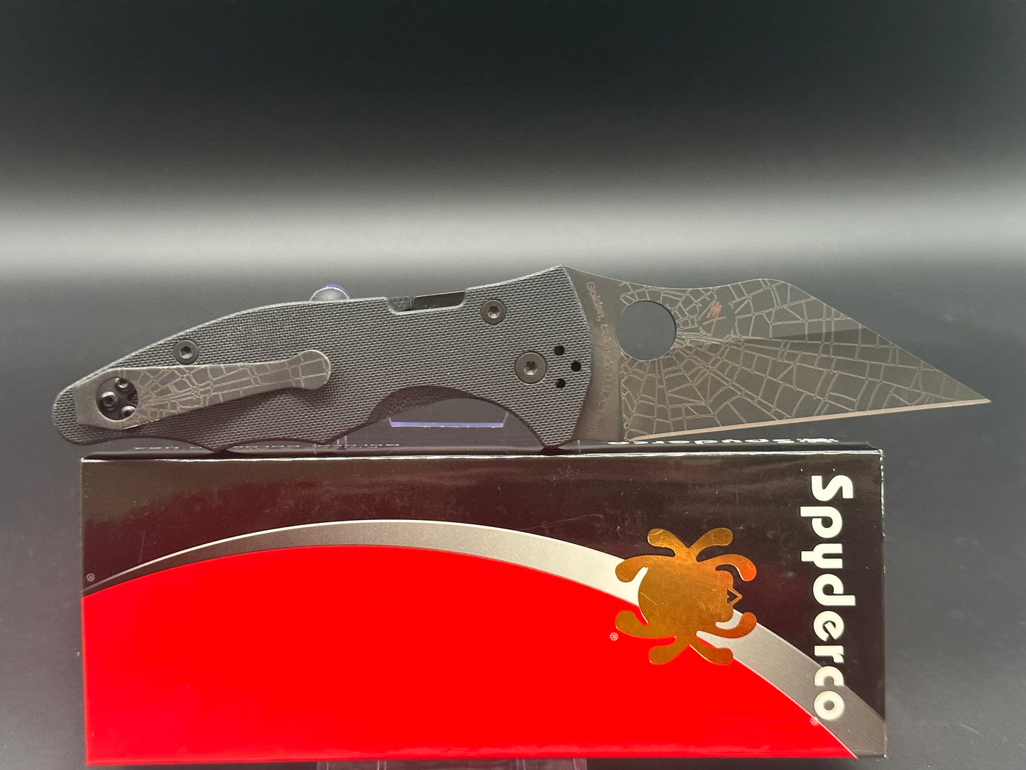 Spyderco Yojimbo 2 Black customized by Lynch NW with laser engraved spider web on blade