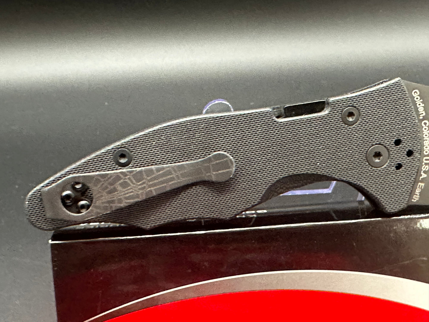 Spyderco Yojimbo 2 Black customized by Lynch NW with laser engraved spider web on blade