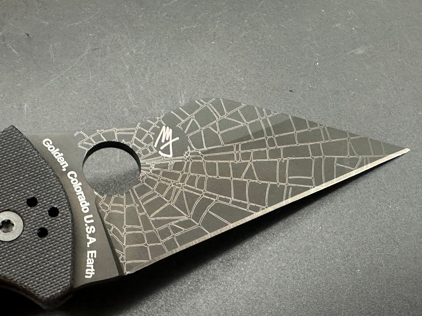 Spyderco Yojimbo 2 Black customized by Lynch NW with laser engraved spider web on blade