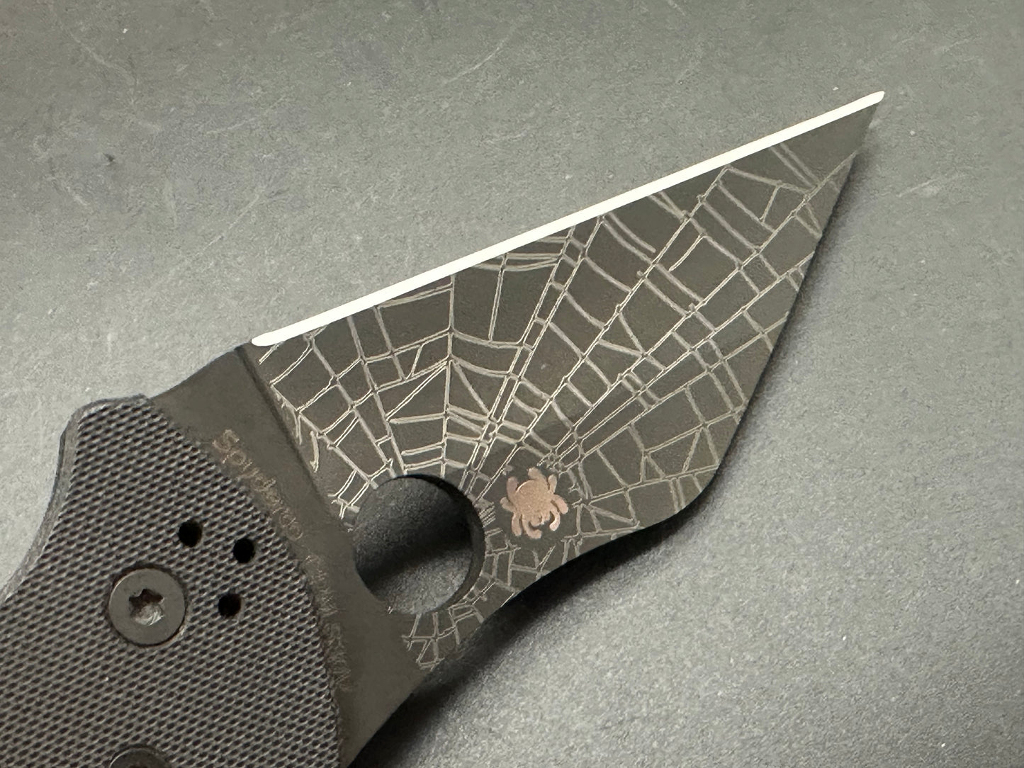 Spyderco Yojimbo 2 Black customized by Lynch NW with laser engraved spider web on blade