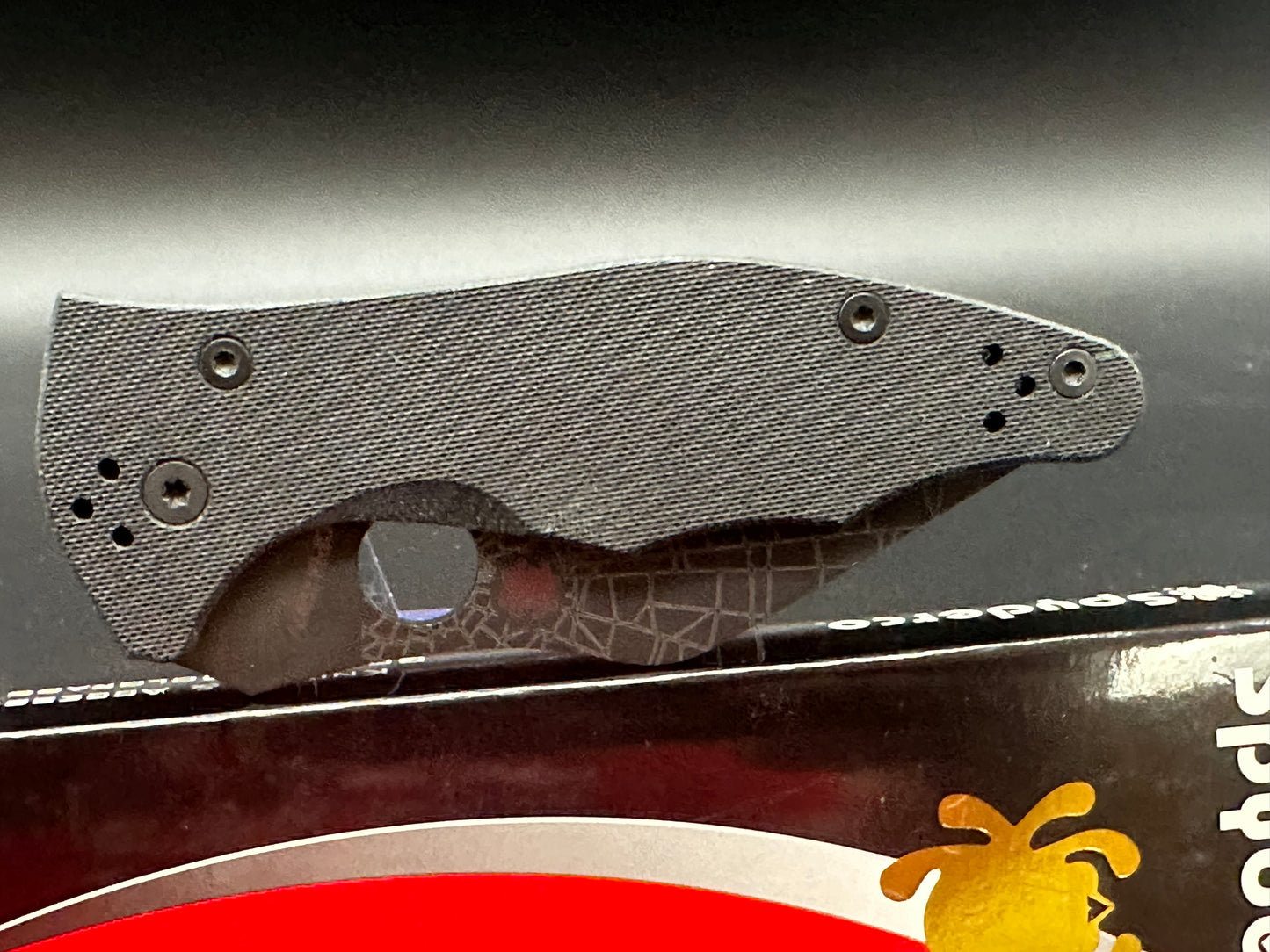 Spyderco Yojimbo 2 Black customized by Lynch NW with laser engraved spider web on blade