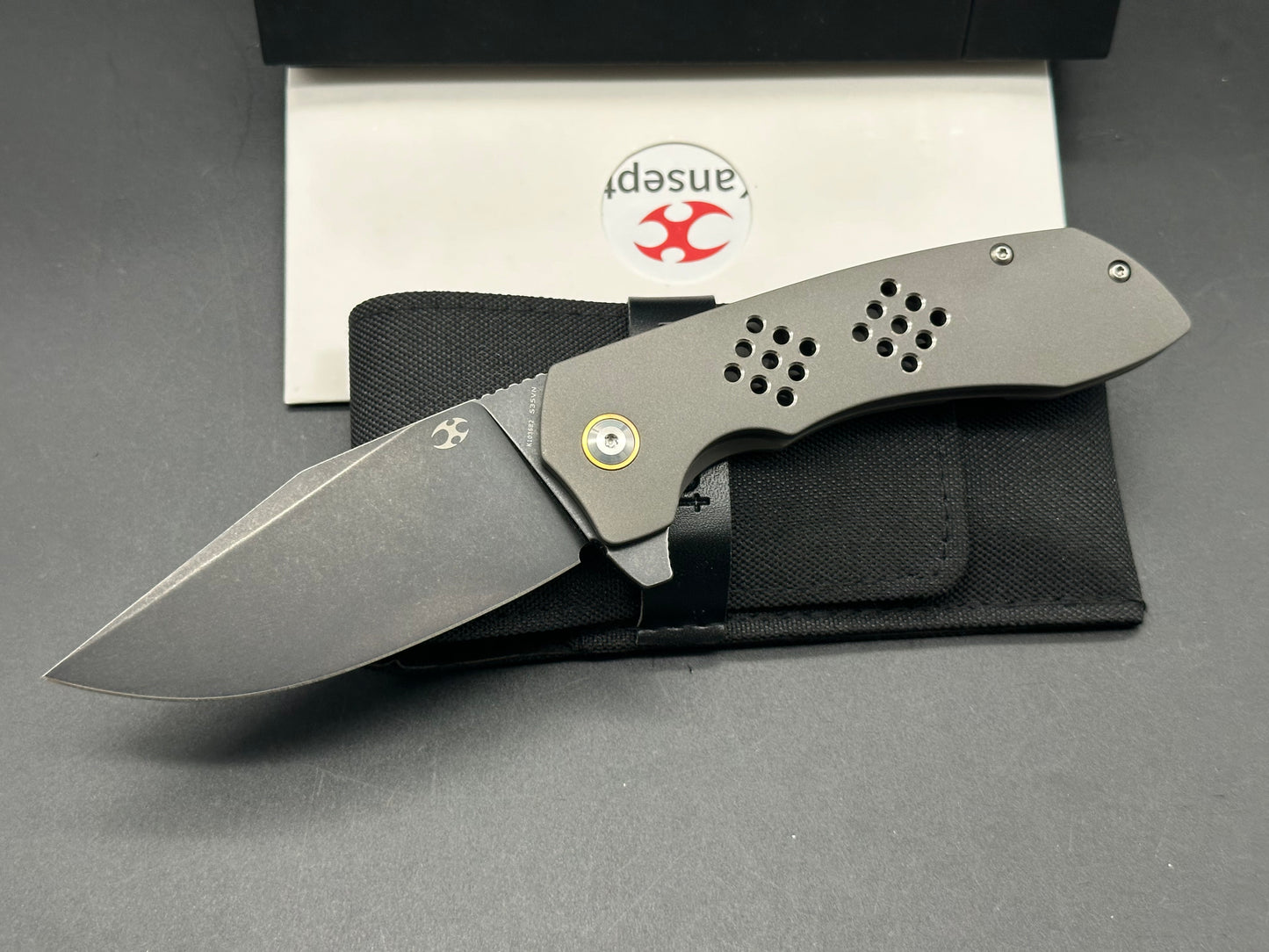 KANSEPT ENTITY FOLDING KNIFE SILICON CARBIDED TITANIUM HANDLE S35VN PLAIN EDGE BLACK/STONEWASH FINISH K1036B2