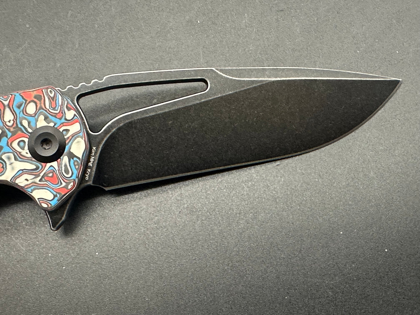 KANSEPT KRYO FOLDING KNIFE RED/BLUE/WHITE NEBULA CARBON FIBER HANDLE S35VN DROP POINT PLAIN EDGE BLACK STONEWASH FINISH K1001M3