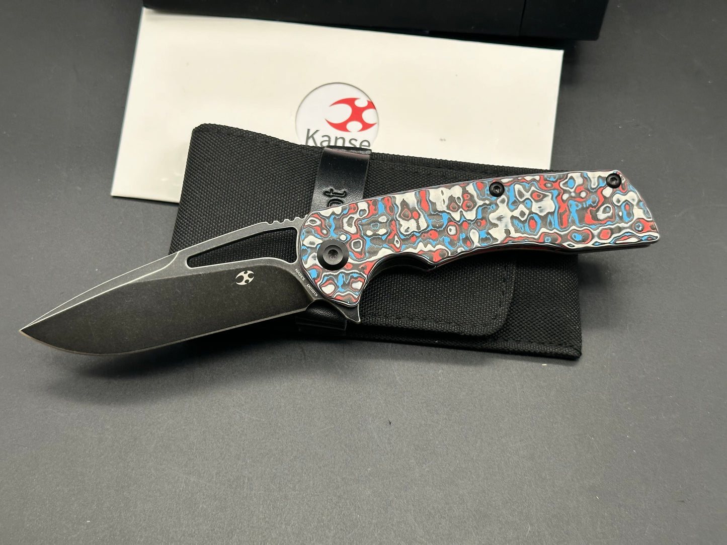 KANSEPT KRYO FOLDING KNIFE RED/BLUE/WHITE NEBULA CARBON FIBER HANDLE S35VN DROP POINT PLAIN EDGE BLACK STONEWASH FINISH K1001M3