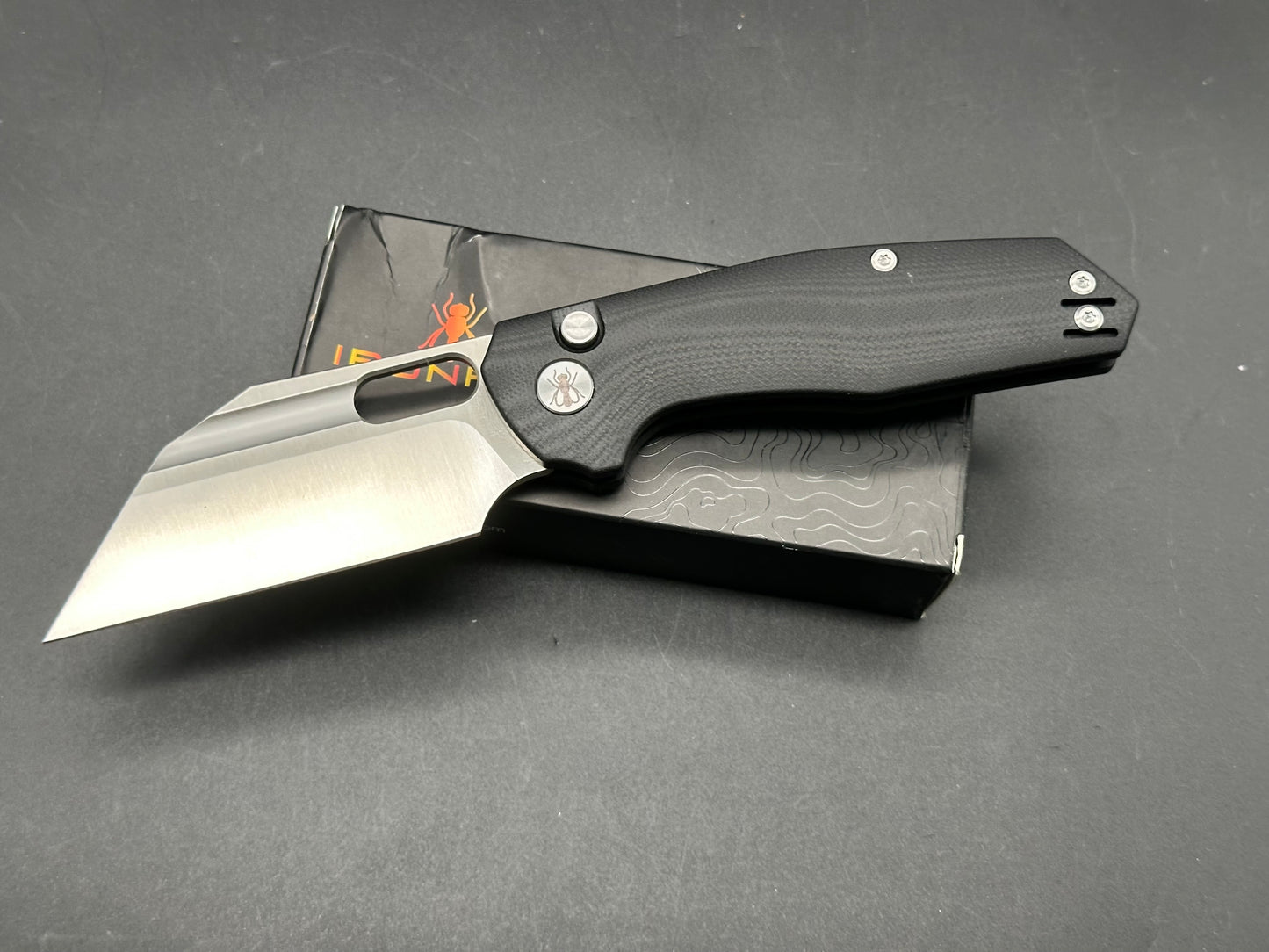 Ironfly (Kunwu) YOLO, Button Lock 14C28N Blade with Black G10 Handle