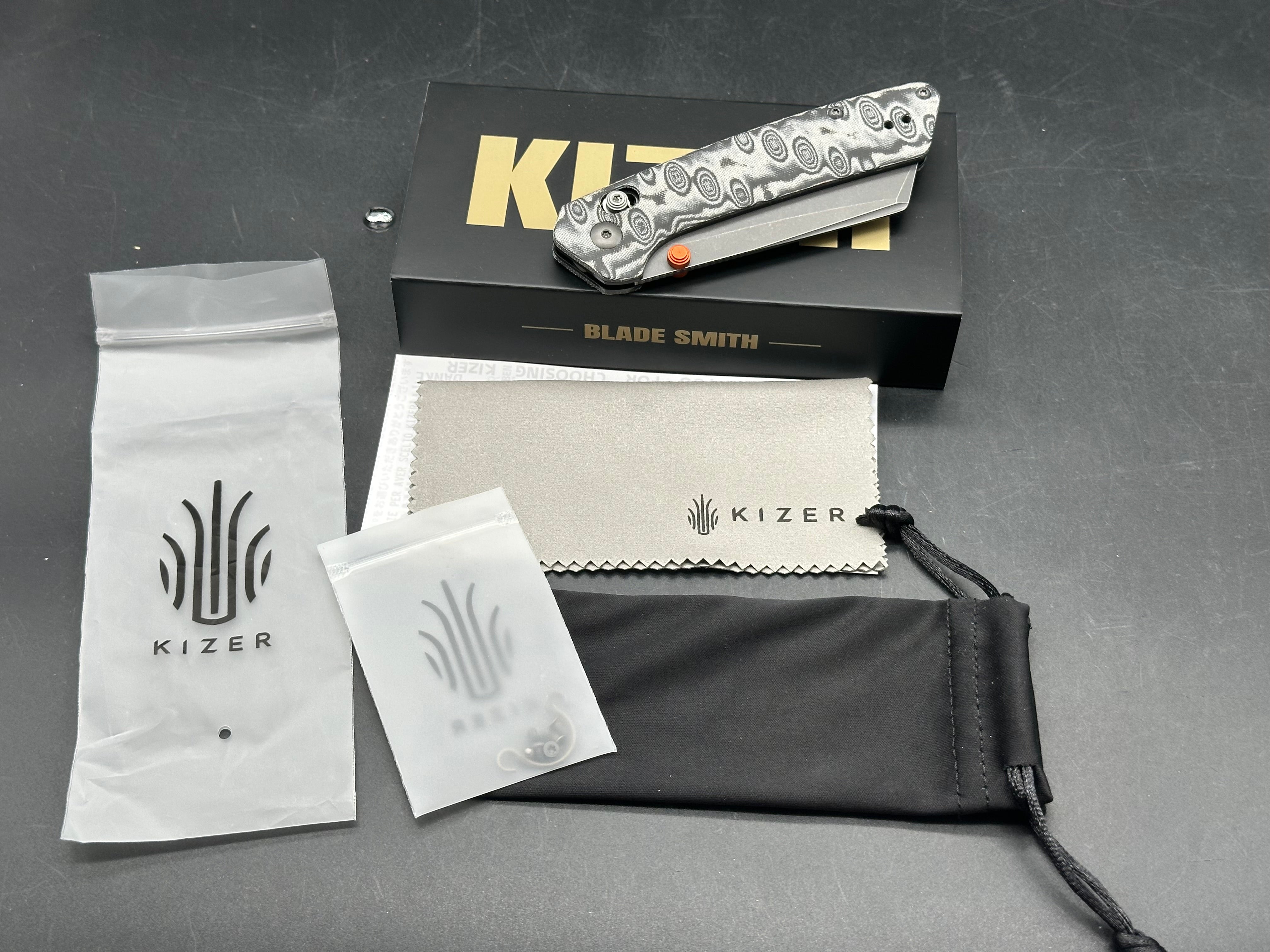 KIZER MADRAC CL AIRTI BLACK GRAY VORTEX PATTERN MICARTA HANDLE M390 SHEEPSFOOT