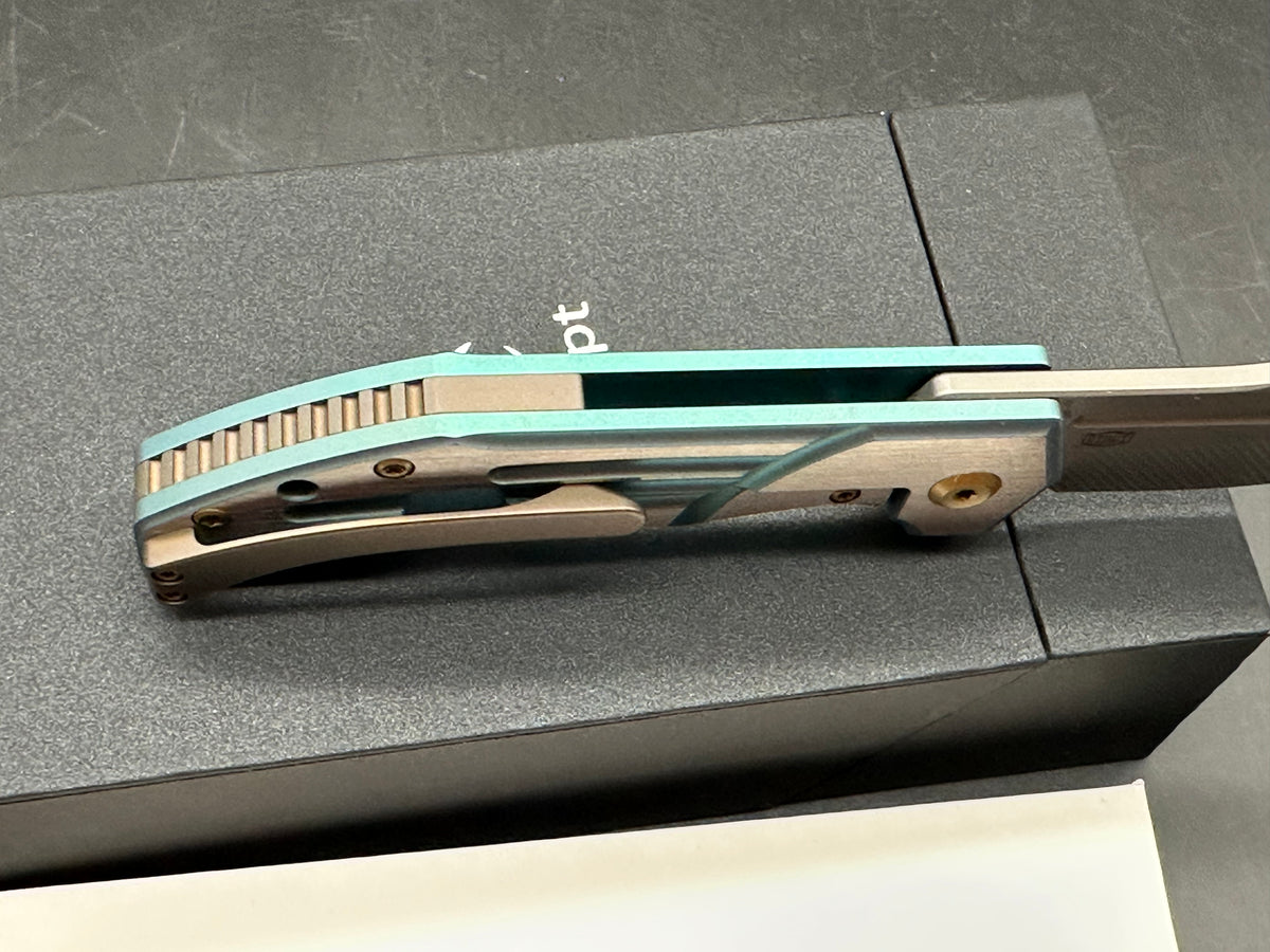 KANSEPT ORION GREEN/MACHINE SATIN TITANIUM HANDLE S35VN CLIP POINT