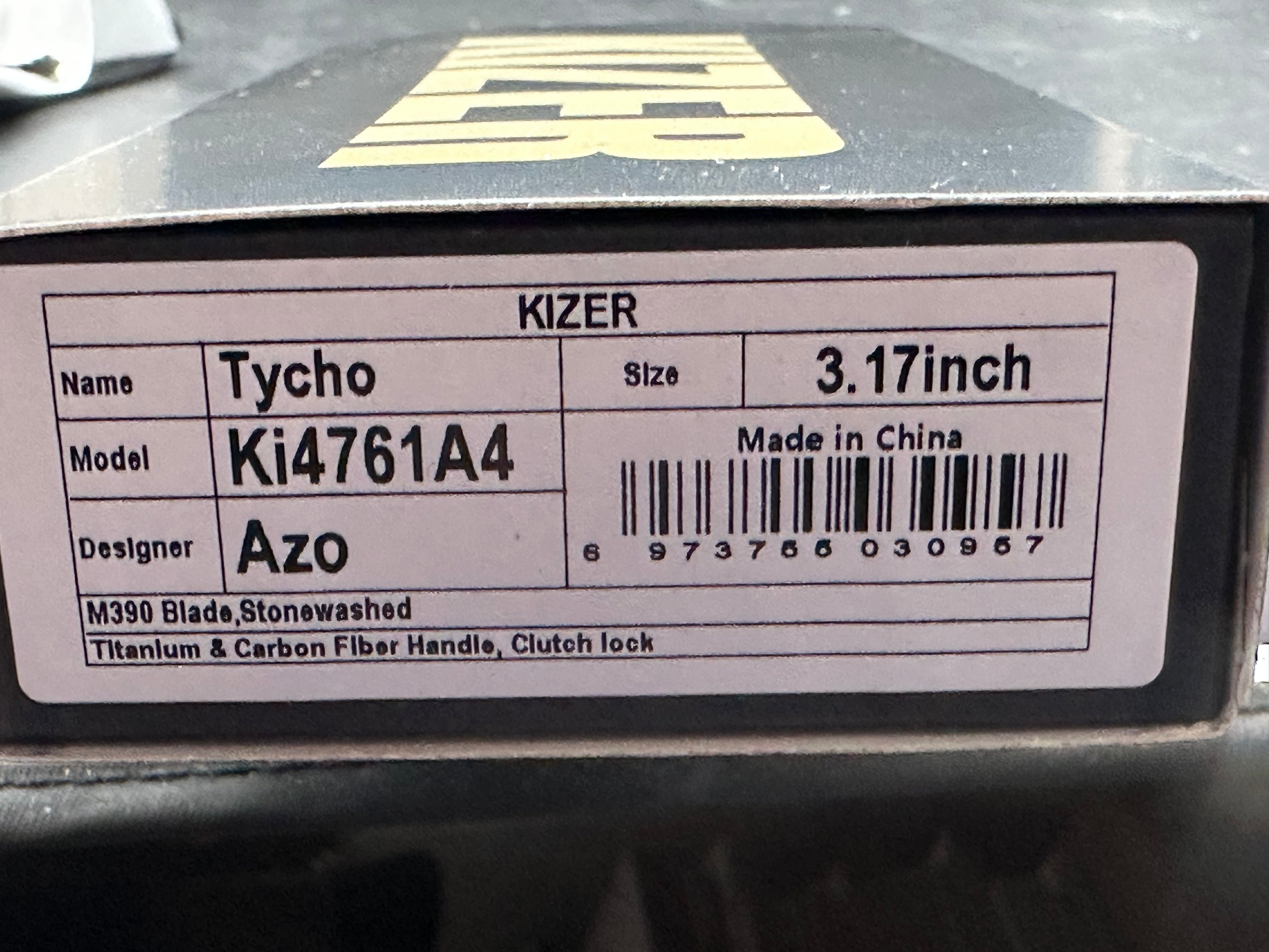 KIZER TYCHO FOLDING KNIFE TITANIUM/CARBON FIBER HANDLE M390 CLIP POINT PLAIN EDGE STONEWASH FINISH