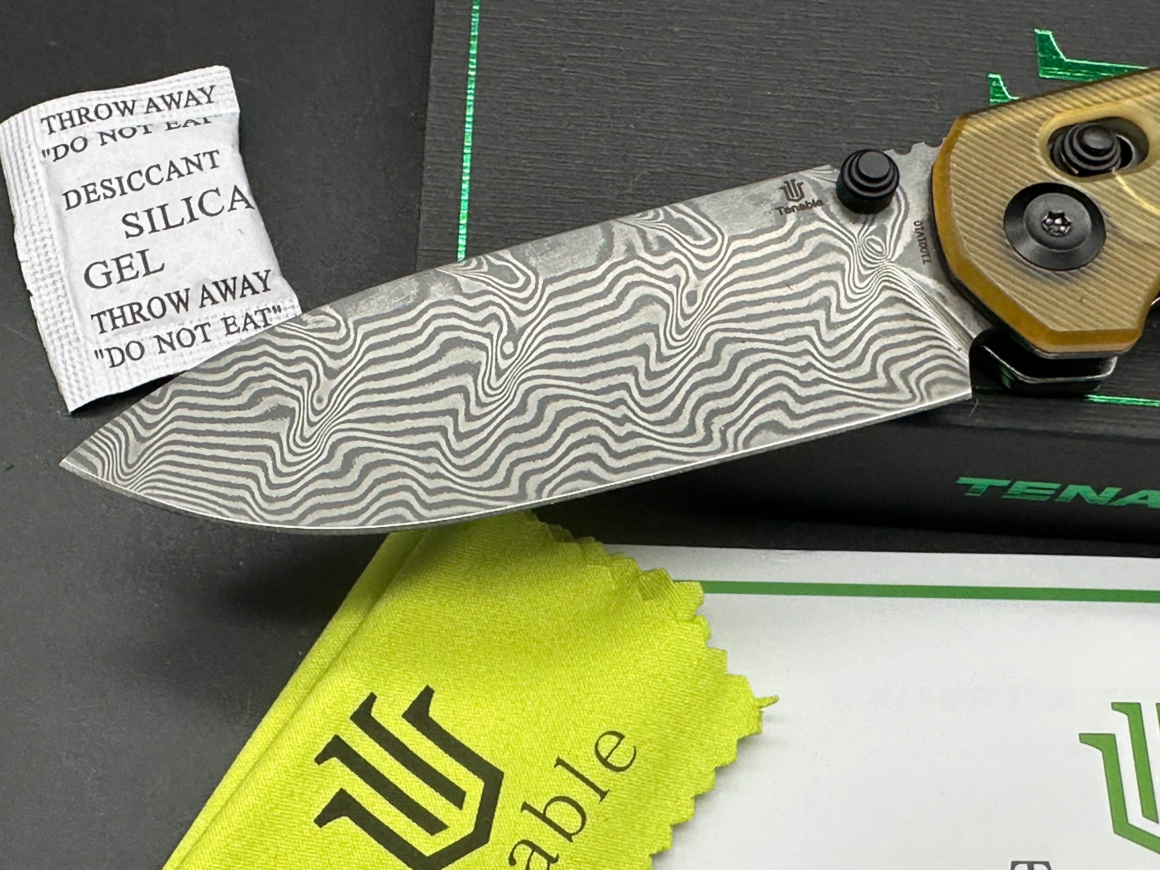 TENABLE KRYO FOLDING KNIFE AMBER PEI/ULTEM HANDLE DAMASCUS DROP POINT PLAIN EDGE