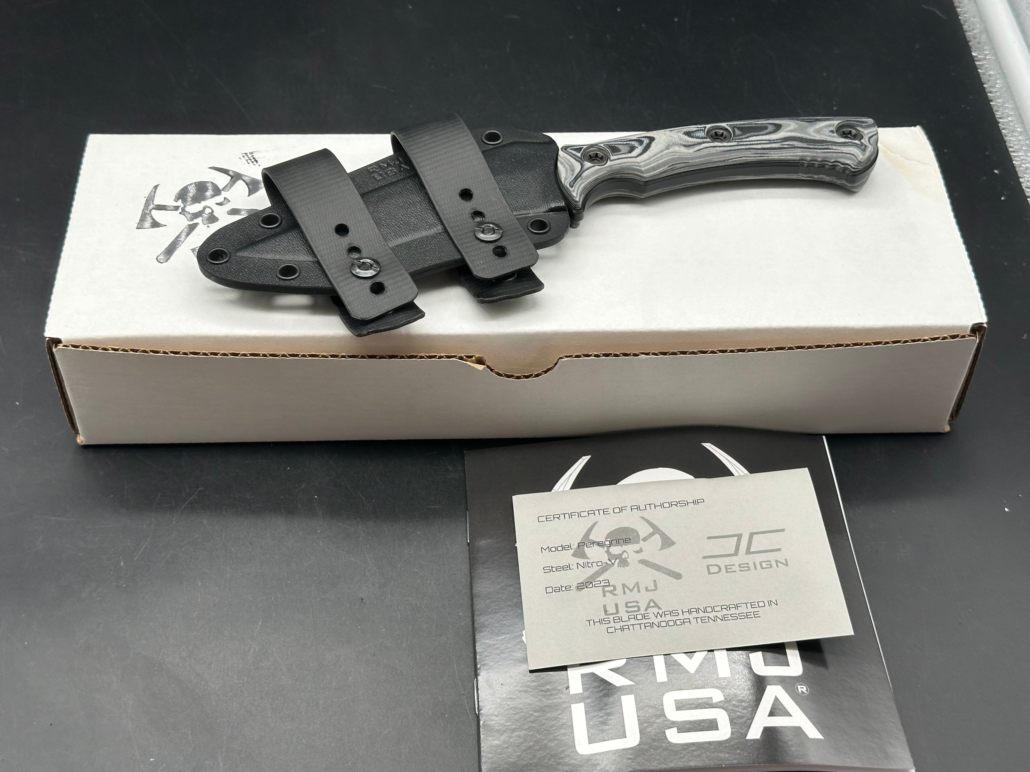 RMJ Tactical Peregrine DLT Exclusive with Urban Camo handles. Black Nitro-V blade