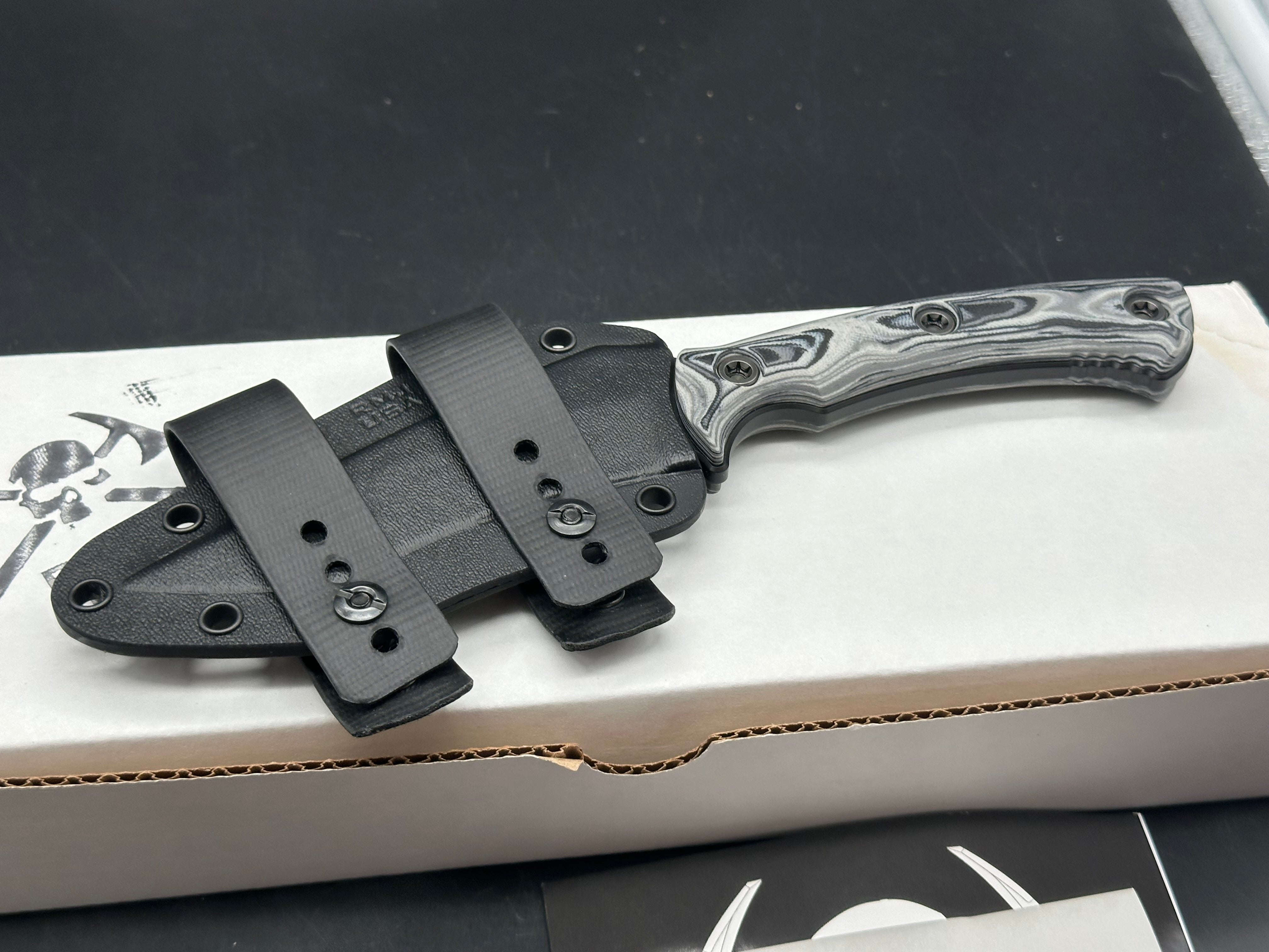 RMJ Tactical Peregrine DLT Exclusive with Urban Camo handles. Black Nitro-V blade
