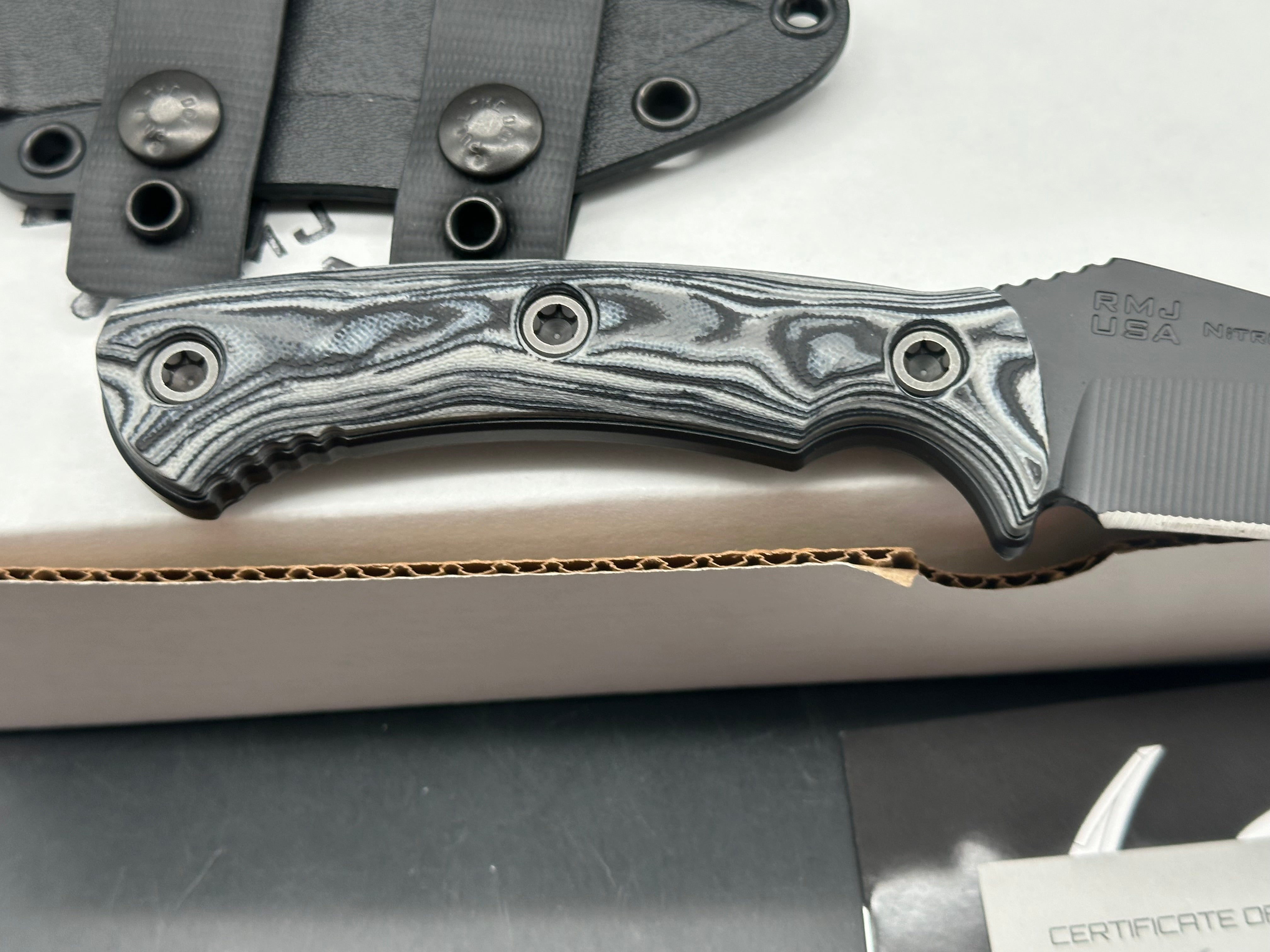 RMJ Tactical Peregrine DLT Exclusive with Urban Camo handles. Black Nitro-V blade
