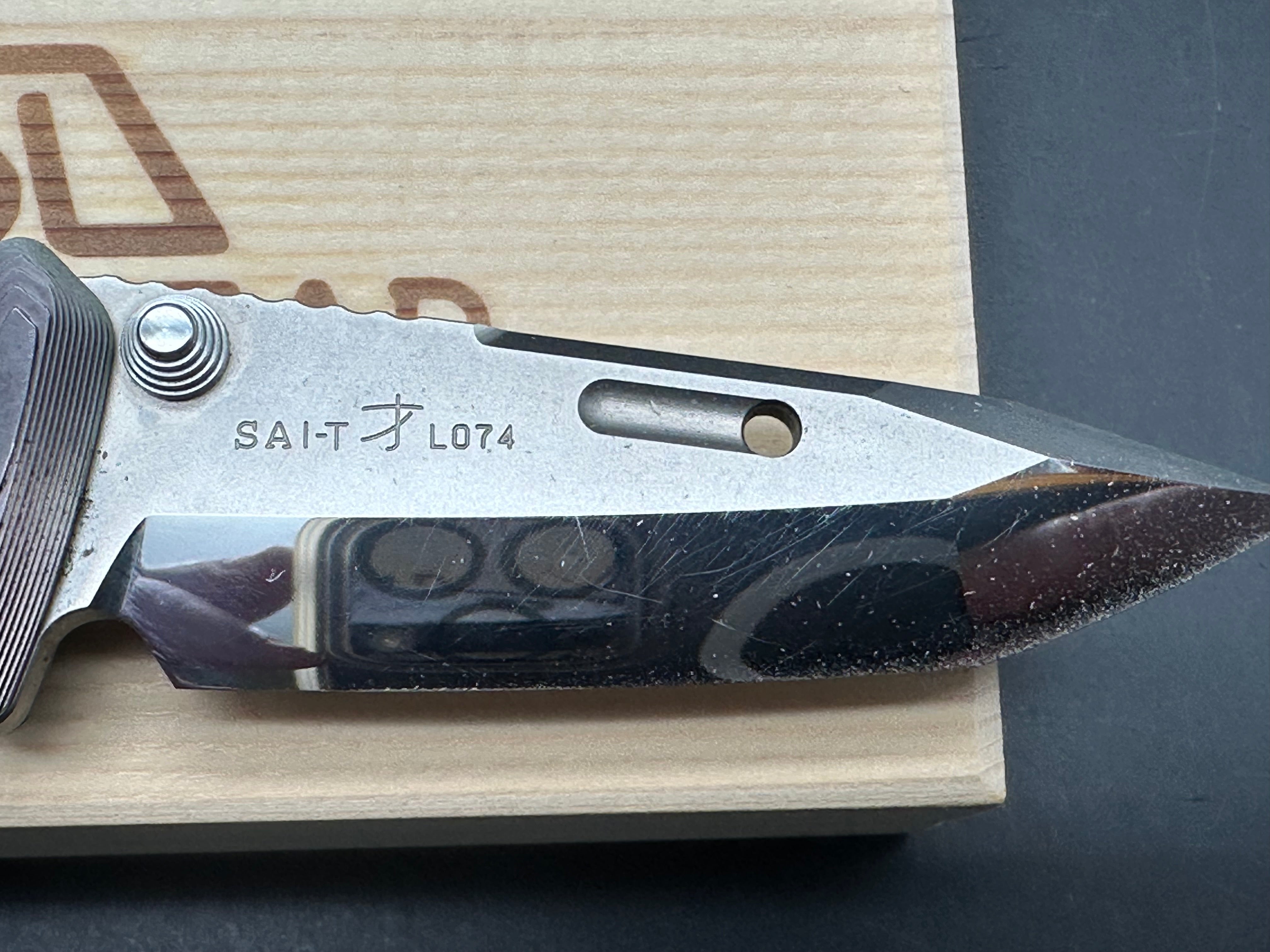 Rockstead SAI-T L074 DP clad (ZDP189/VG10) blade folder