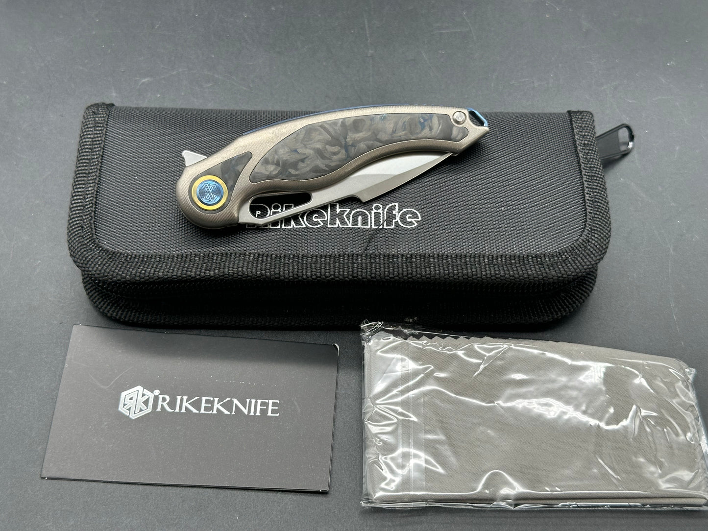 Rike Knife Unicorn/Grey Ti Frame w/ Marble CF Inlay Satin M390