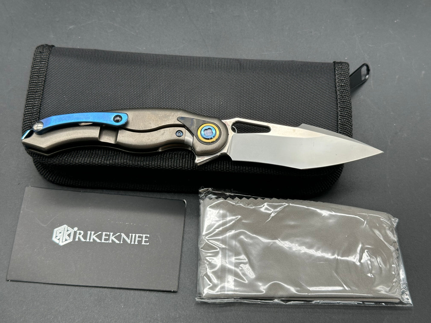 Rike Knife Unicorn/Grey Ti Frame w/ Marble CF Inlay Satin M390