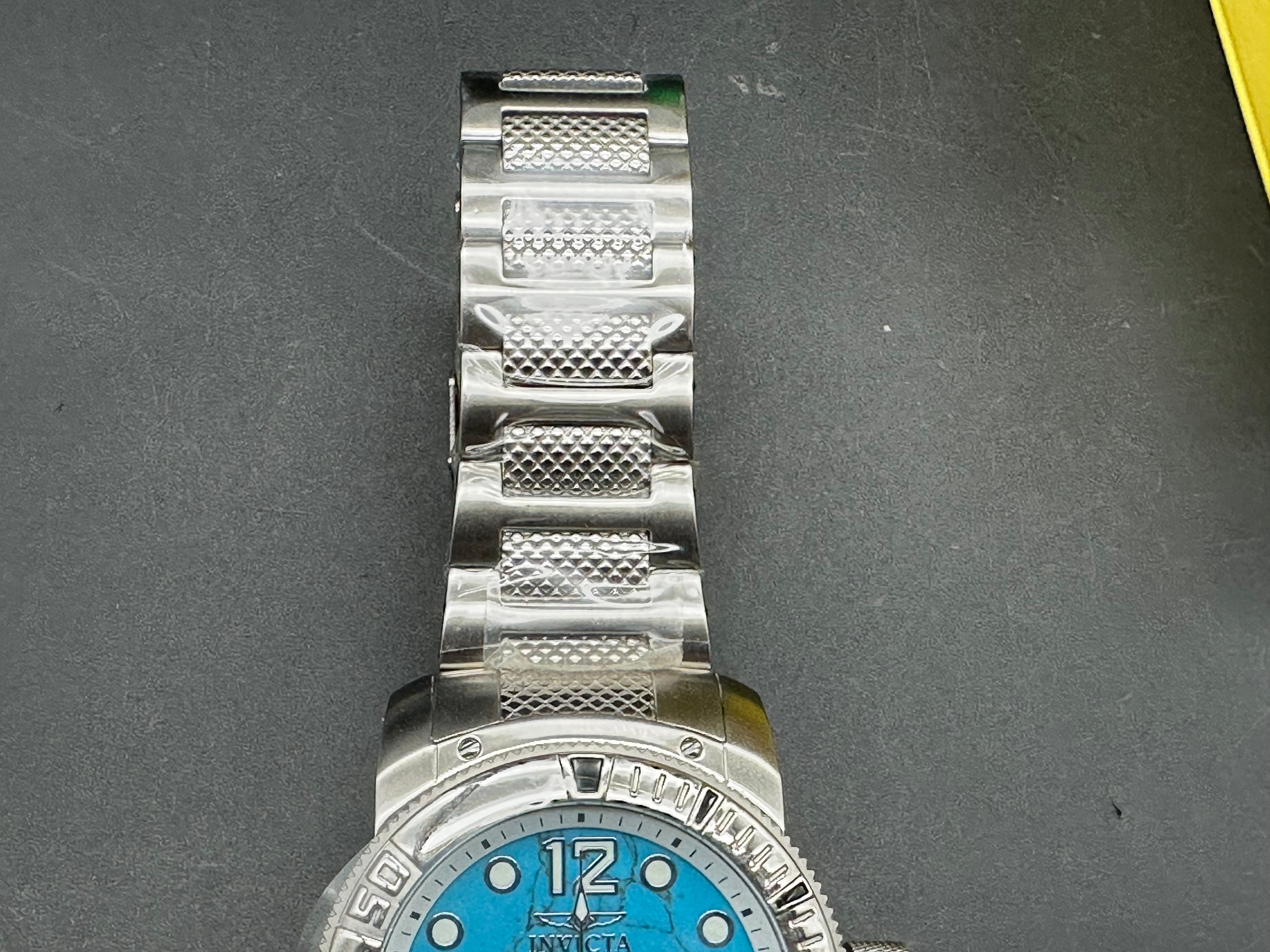 Invicta watch with turquoise dial. BNIB with brand new battery