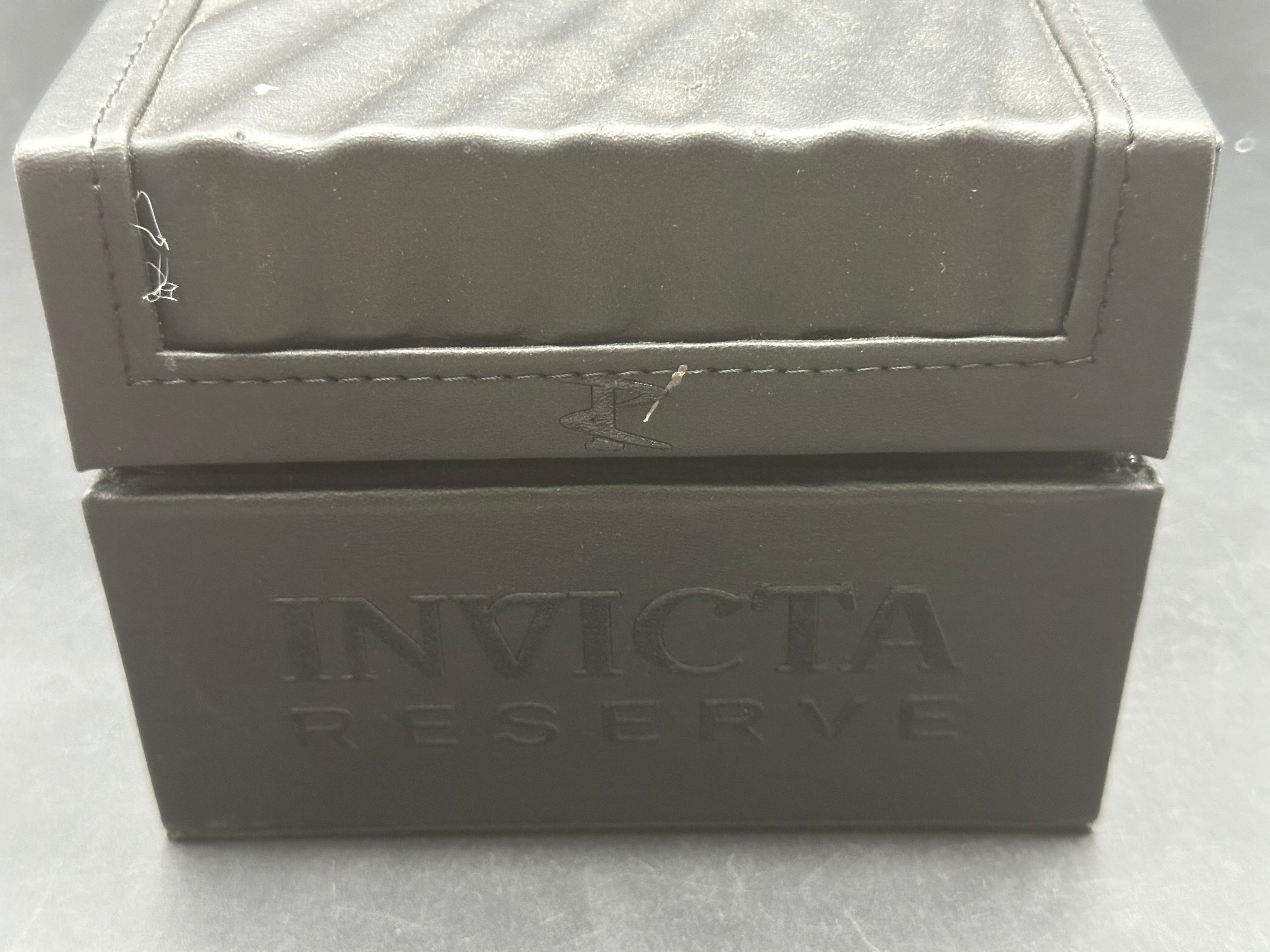 Invicta watch with mother of pearl dial
