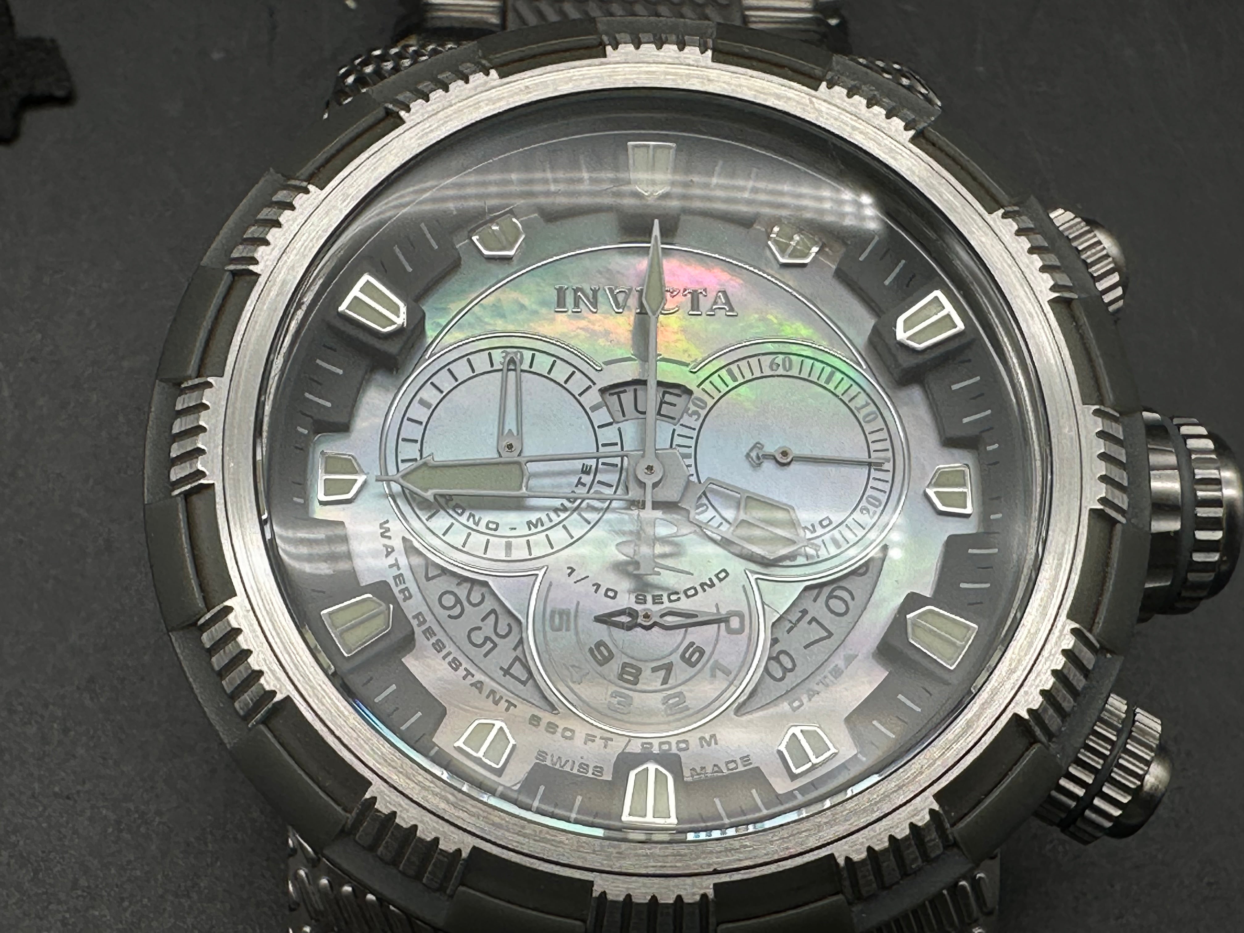 Invicta watch with mother of pearl dial