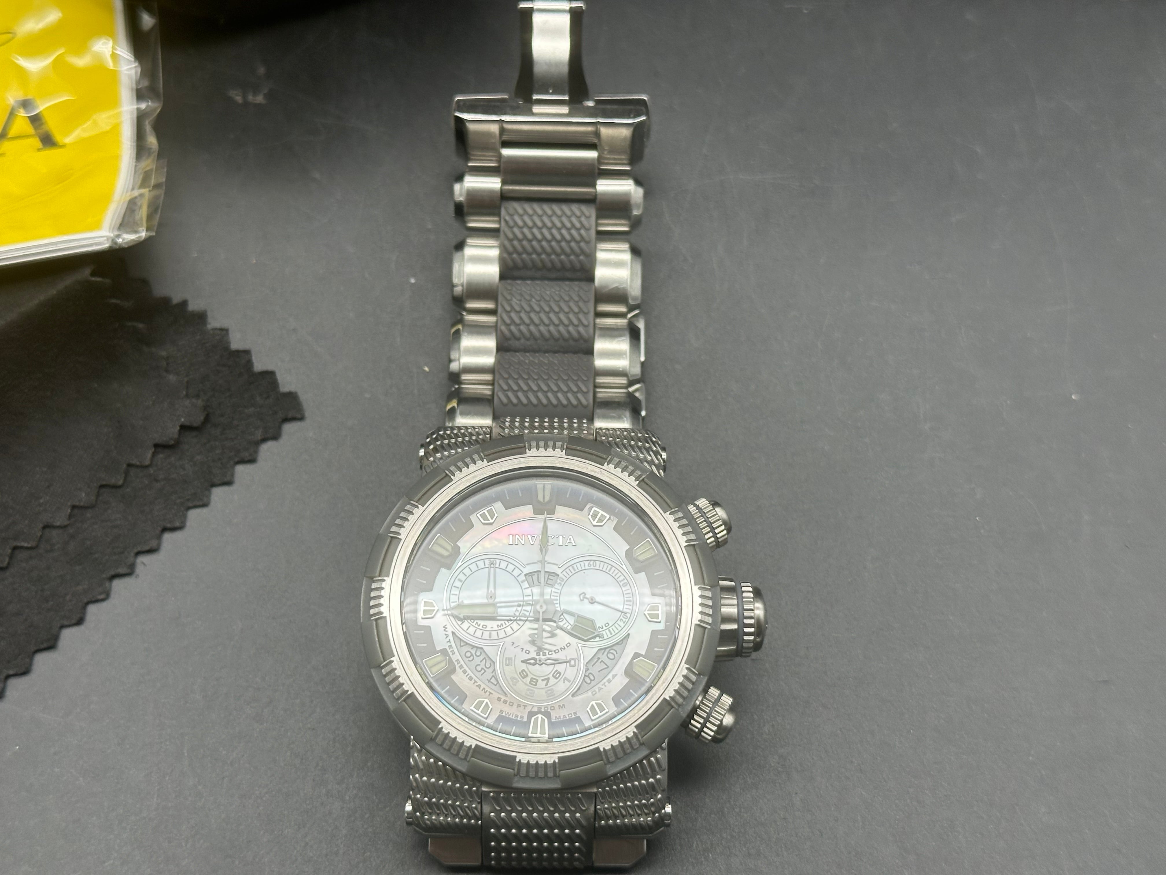 Invicta watch with mother of pearl dial