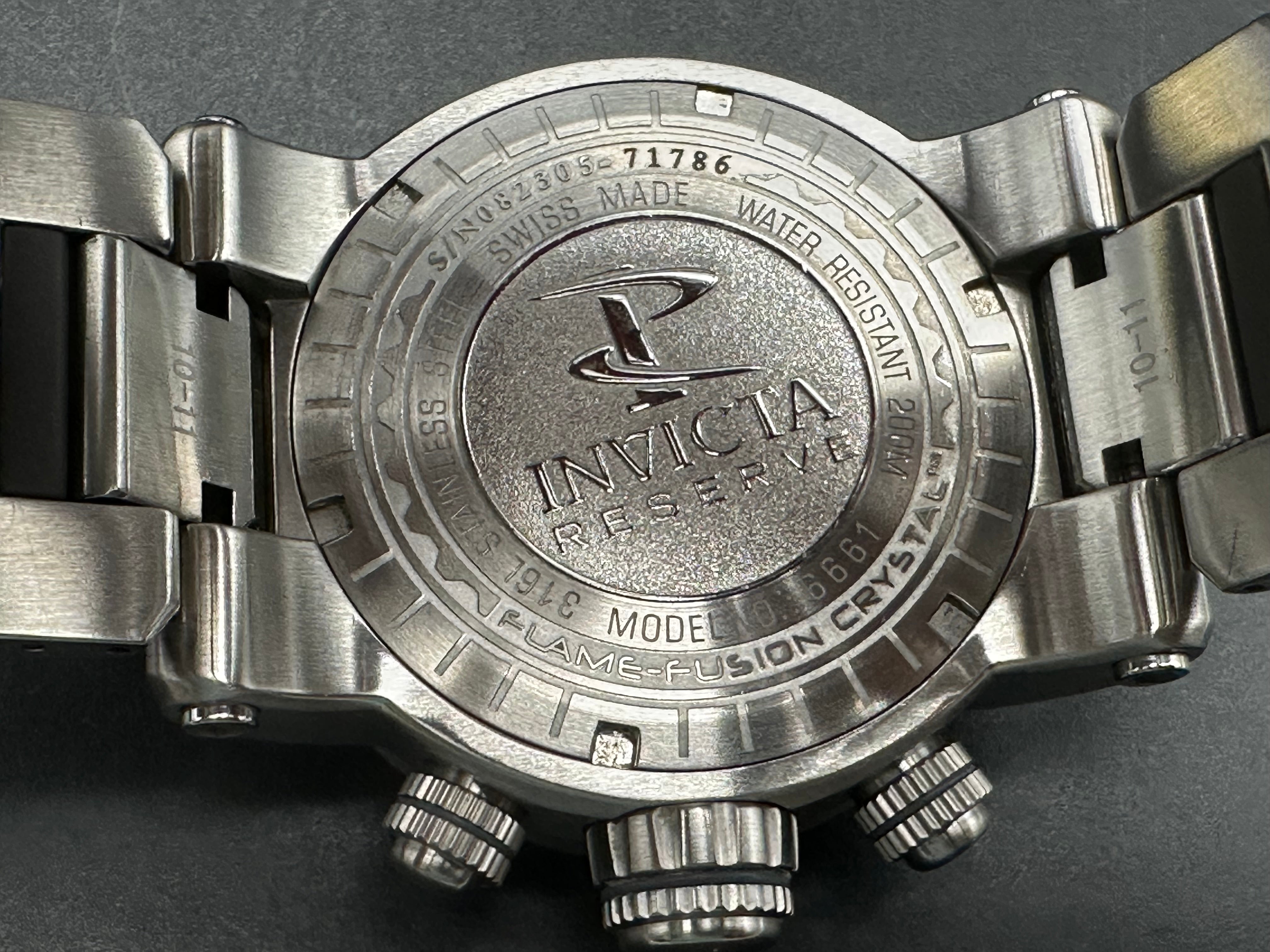 Invicta watch with mother of pearl dial