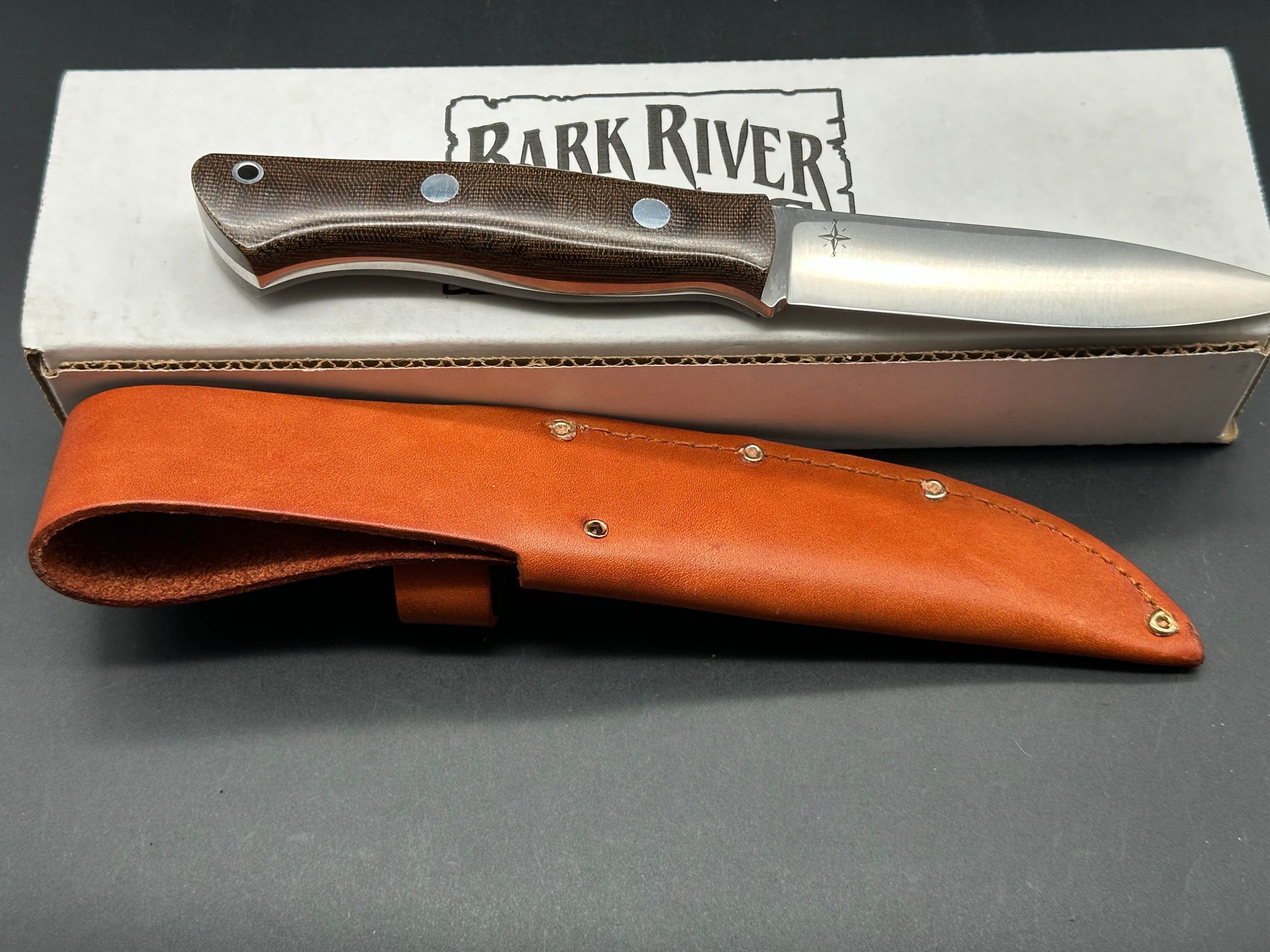 Bark River Aurora green canvas micarta scales, A-2 tool steel blade, brown leather sheath