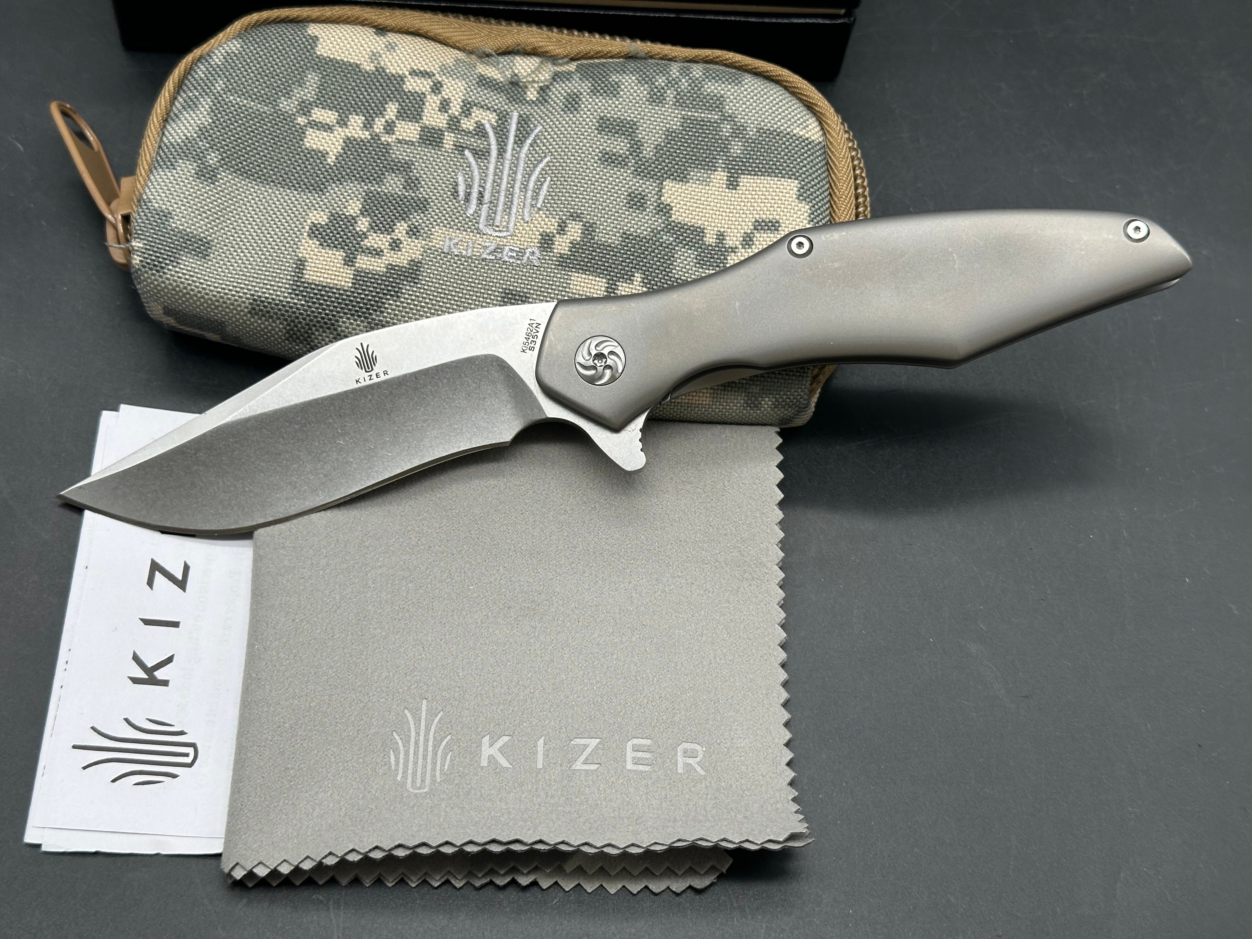 Kizer Trifecta: Matt Cuchiara design. 3.875 stonewash, drop point, hollow grind CPM-S35VN blade. Titanium handle with milled titanium clip