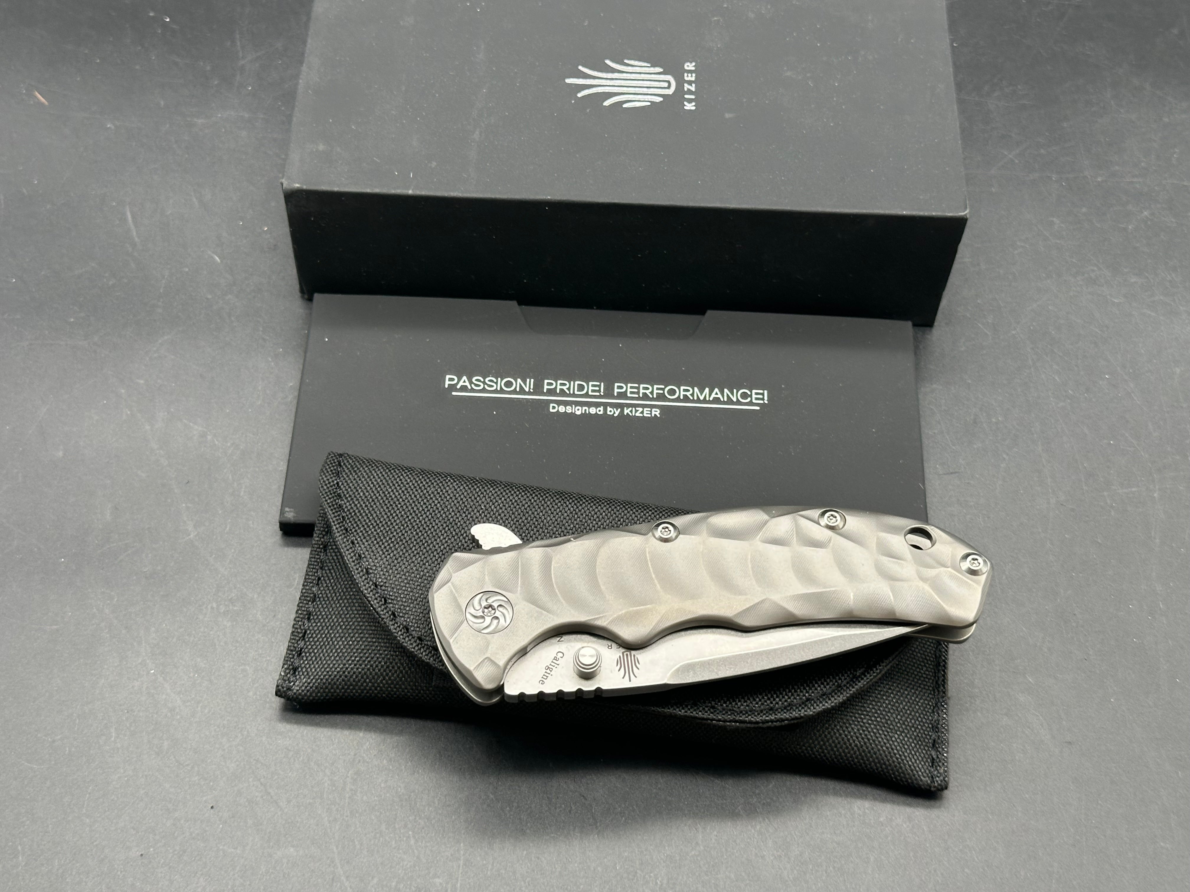 Kizer Caligine 3.58 inch stonewash, drop point, flat grind CPM-S35VN blade. Frame lock. Titanium handle. Titanium clip