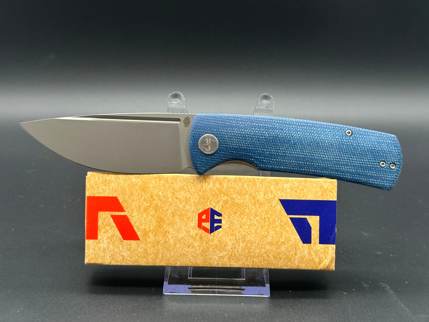 PETRIFIED FISH BELUGA FOLDING KNIFE BLUE MICARTA HANDLE K110 PLAIN EDGE SANDBLASTED FINISH