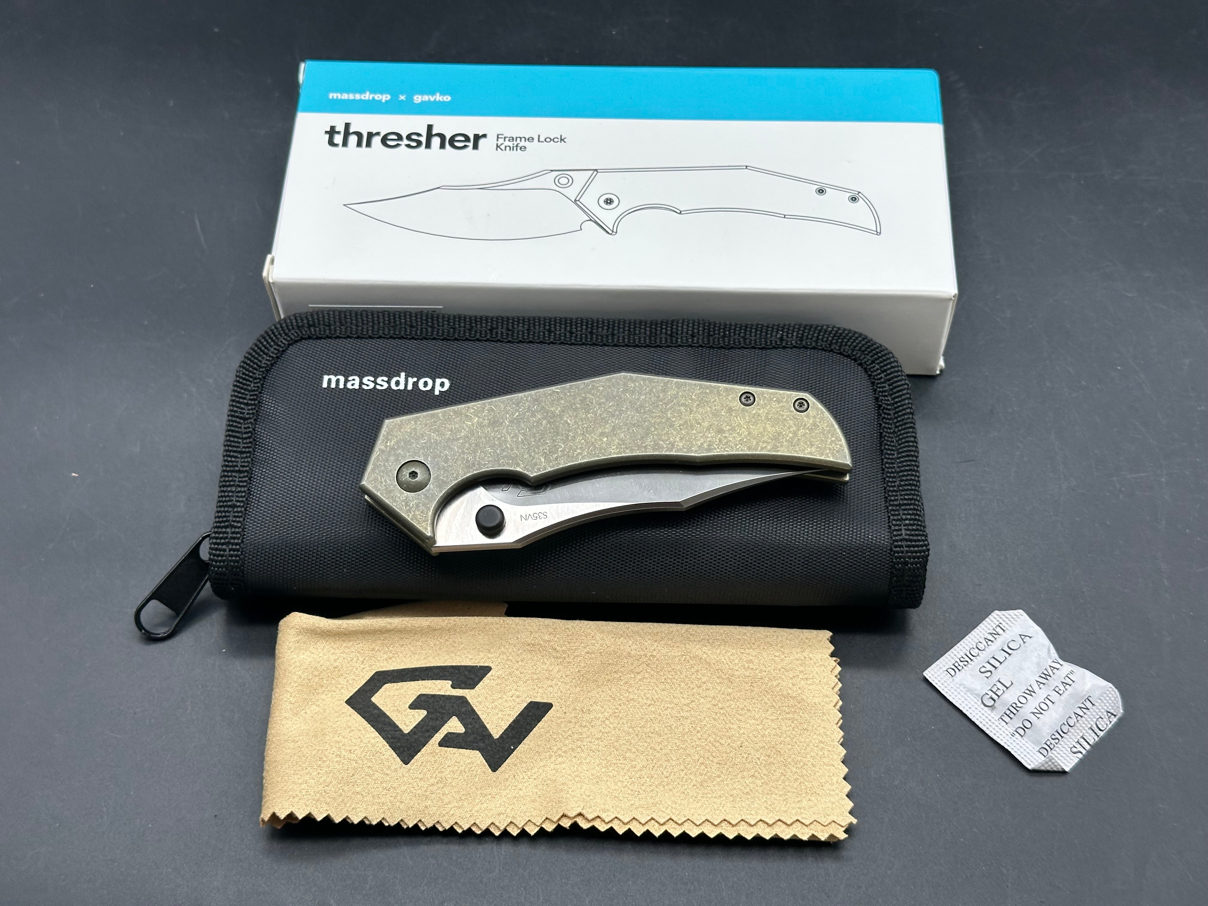 Massdrop Gavko Thresher: Gavko design. 3.5 inch satin finish, clip point CPM-S35VN blade. Tumbled and anodized copper titanium frame