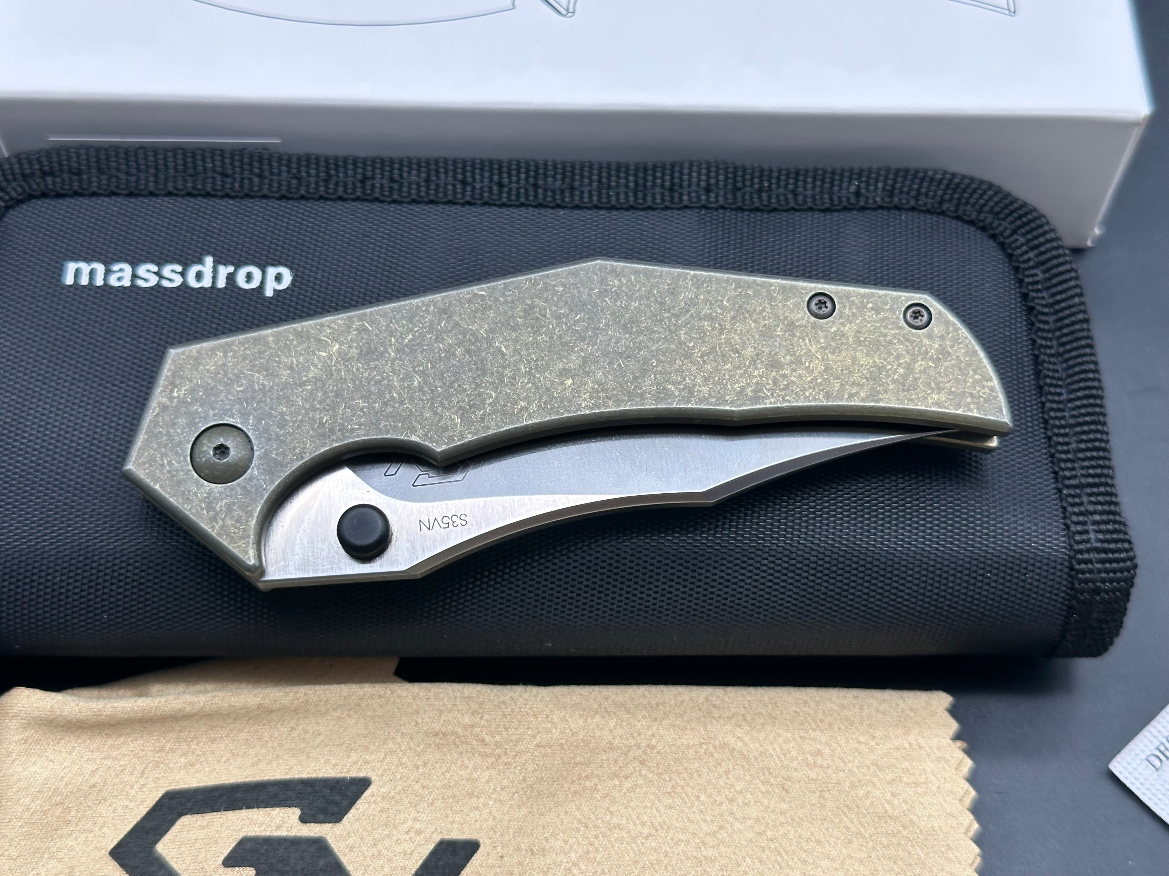 Massdrop Gavko Thresher: Gavko design. 3.5 inch satin finish, clip point CPM-S35VN blade. Tumbled and anodized copper titanium frame